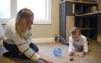 Kade King played with his new pet hamster, Kole, for the first time outside of it's cage since getting it the day before. He and his mom, Kelly, were 