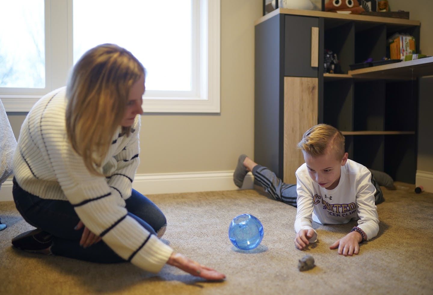 Kade King played with his new pet hamster, Kole, for the first time outside of it's cage since getting it the day before. He and his mom, Kelly, were in his room in their family's Chaska home. ] JEFF WHEELER &#x2022; Jeff.Wheeler@startribune.com Kade King, 12, takes CBD oil twice a day to reduce the frequency of his epileptic seizures. But CBD is not allowed on school grounds, so he can't take it there if he has a seizure.&#xa0;He was photographed at home Wednesday afternoon, January 22, 2020 in