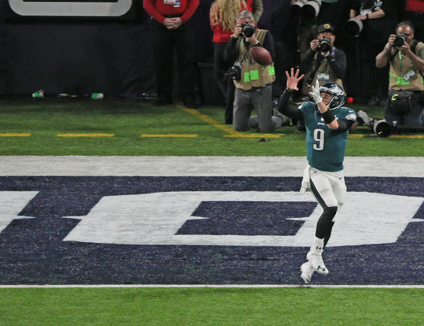 Philadelphia Eagles quarterback Nick Foles (9) caught a 1-yard touchdown pass from tight end Trey Burton near the end of the second quarter of Super Bowl LII.