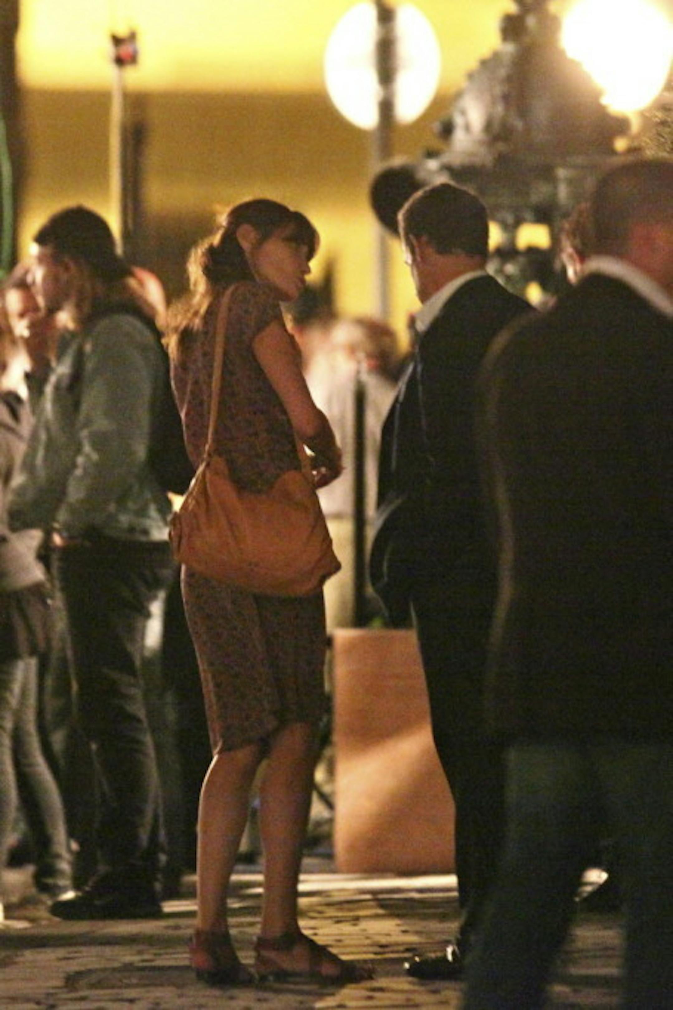 Carla and husband Nicolas chat on the set.