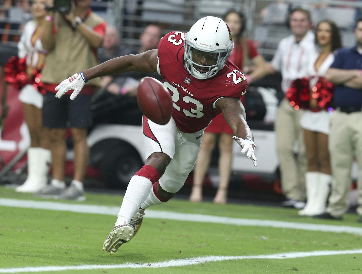 Arizona Cardinals special teams player Bene' Benwikere tries to keep a punt from entering the end zone during the first half of an NFL football game against the Chicago Bears, Sunday, Sept. 23, 2018, in Glendale, Ariz. (AP Photo/Ralph Freso) ORG XMIT: NYOTK