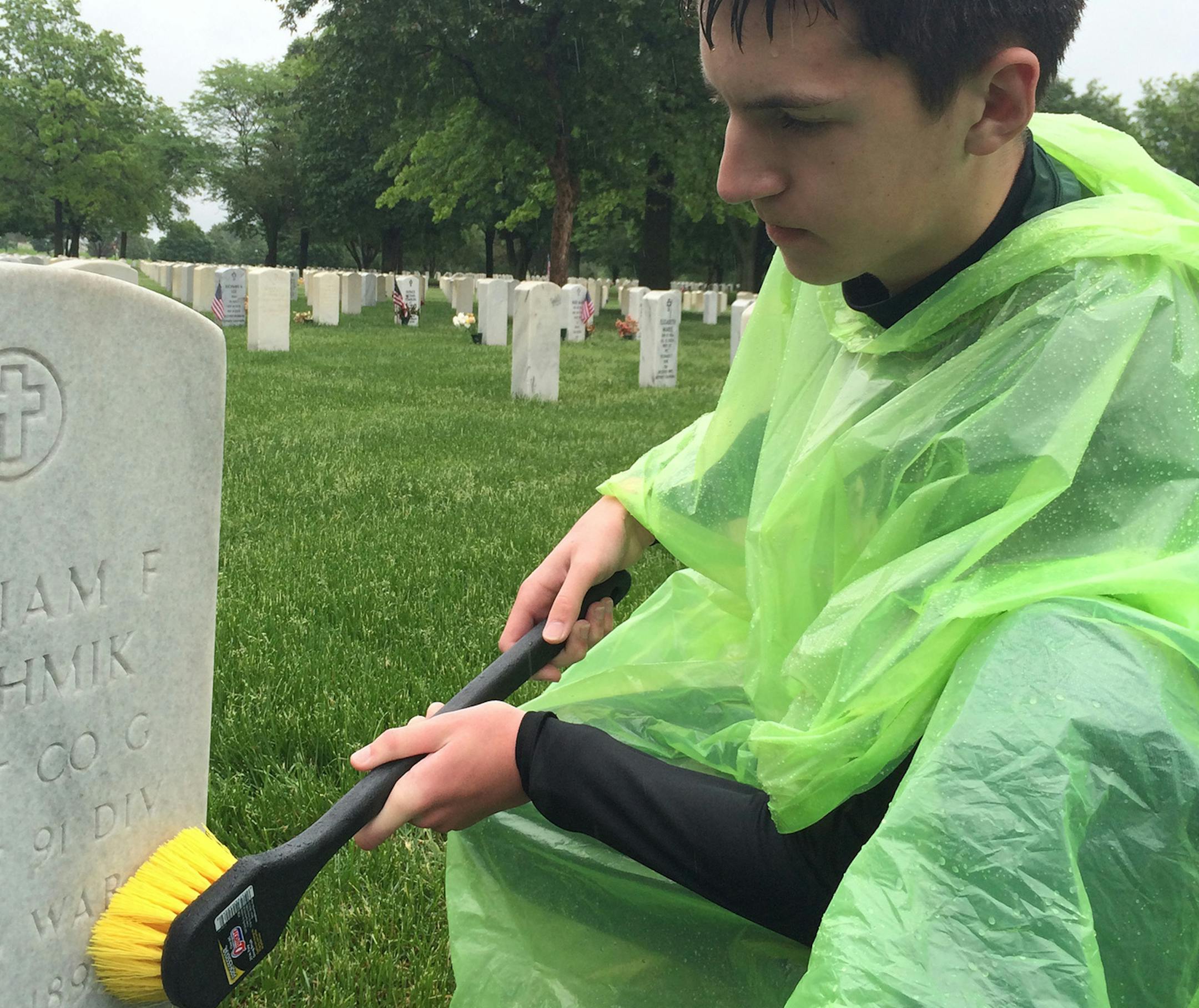 Boy Scout Garrett McKay — who loves history and is especially interested in wars — scoured headstones of veterans at Fort Snelling Cemetery.