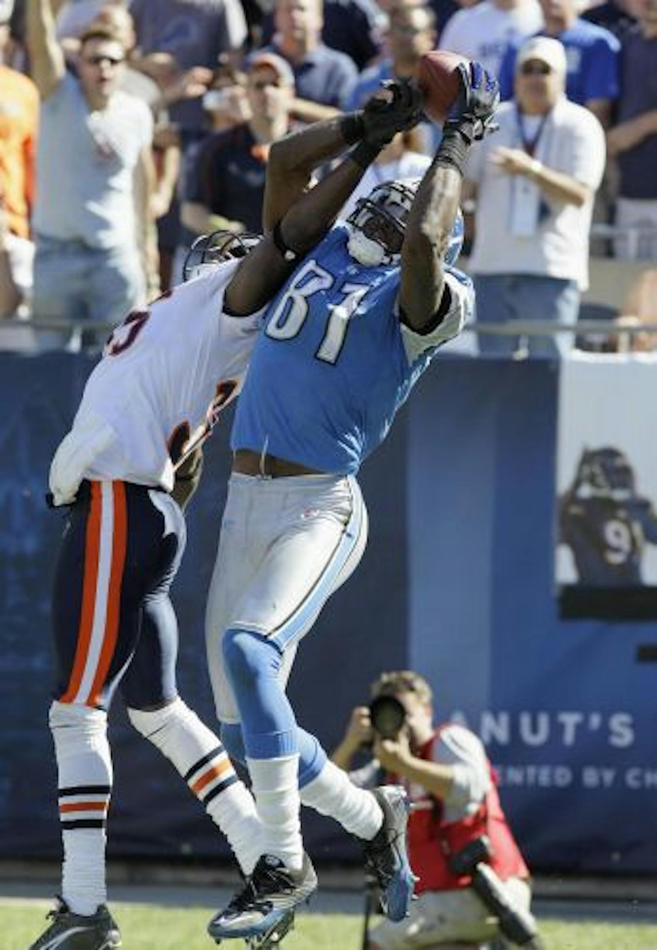 Detroit Lions wide receiver Calvin Johnson hauled in what looked to be a go-ahead touchdown pass over Chicago Bears cornerback Zack Bowman late in Sunday's game at Soldier Field. But the play was ruled incomplete and the Bears held on.