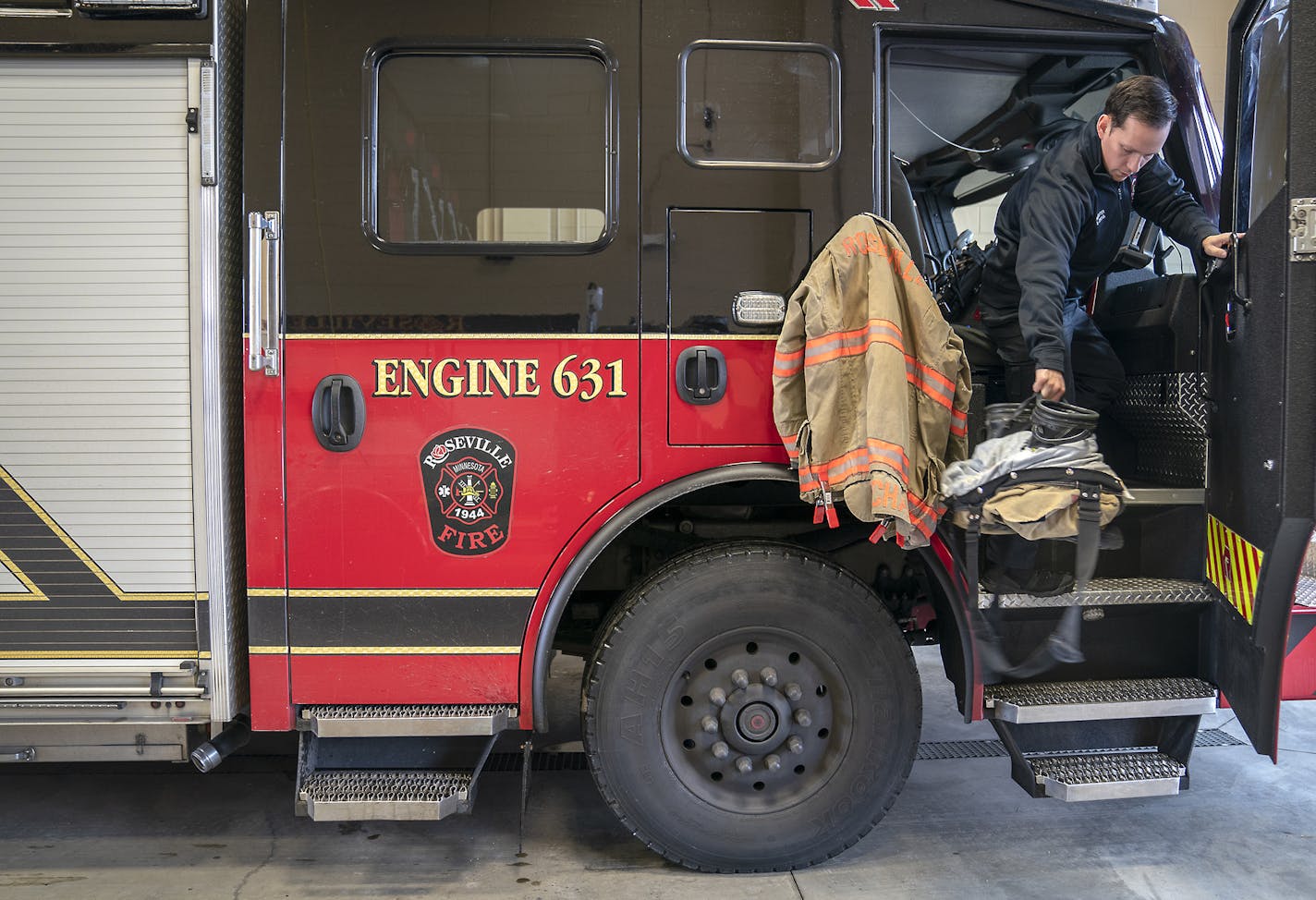 Roseville Fire Department Firefighter Dan Concha made his way off of a fire truck after a medical call, Friday, November 30, 2018 in Roseville, MN. ] ELIZABETH FLORES &#x2022; liz.flores@startribune.com