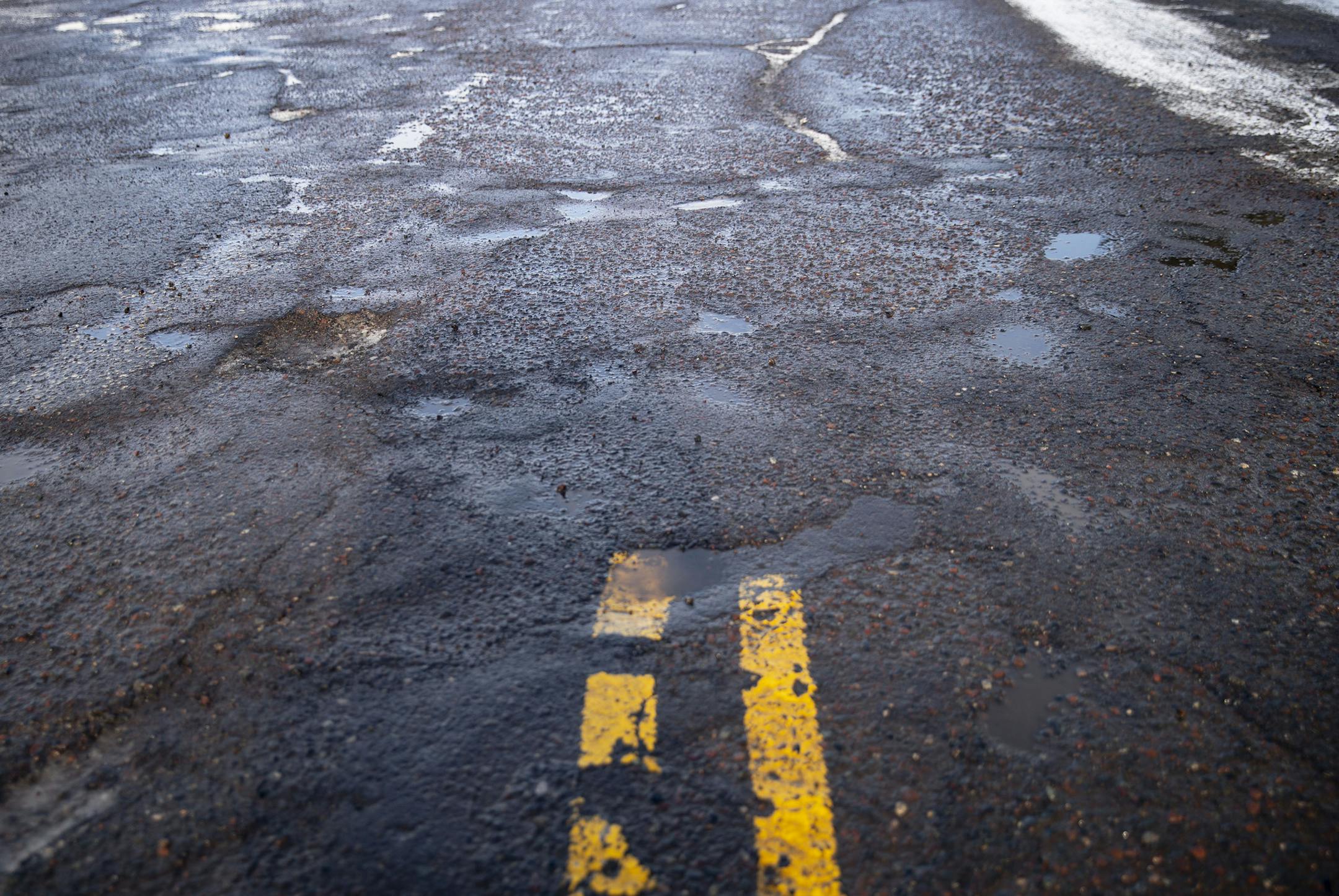 N. Basswood Ave. in Duluth, MN is slotted to be completely redone and paved in 2020. The road is currently covered in potholes and uneven pavement. ]
ALEX KORMANN &#x2022; alex.kormann@startribune.com The voter-approved half percent raise in taxes to repair roads around Duluth will finally be in effect for potholes to be filled starting in the New Year.