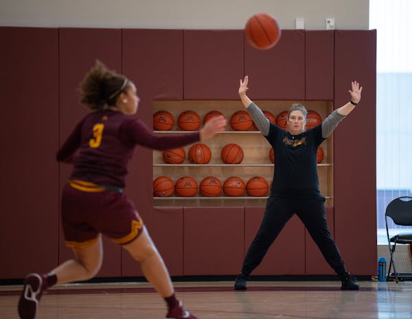 Gophers coach Lindsay Whalen worked with freshman Amaya Battle in an Oct. 4 practice at the Athletes Village. 