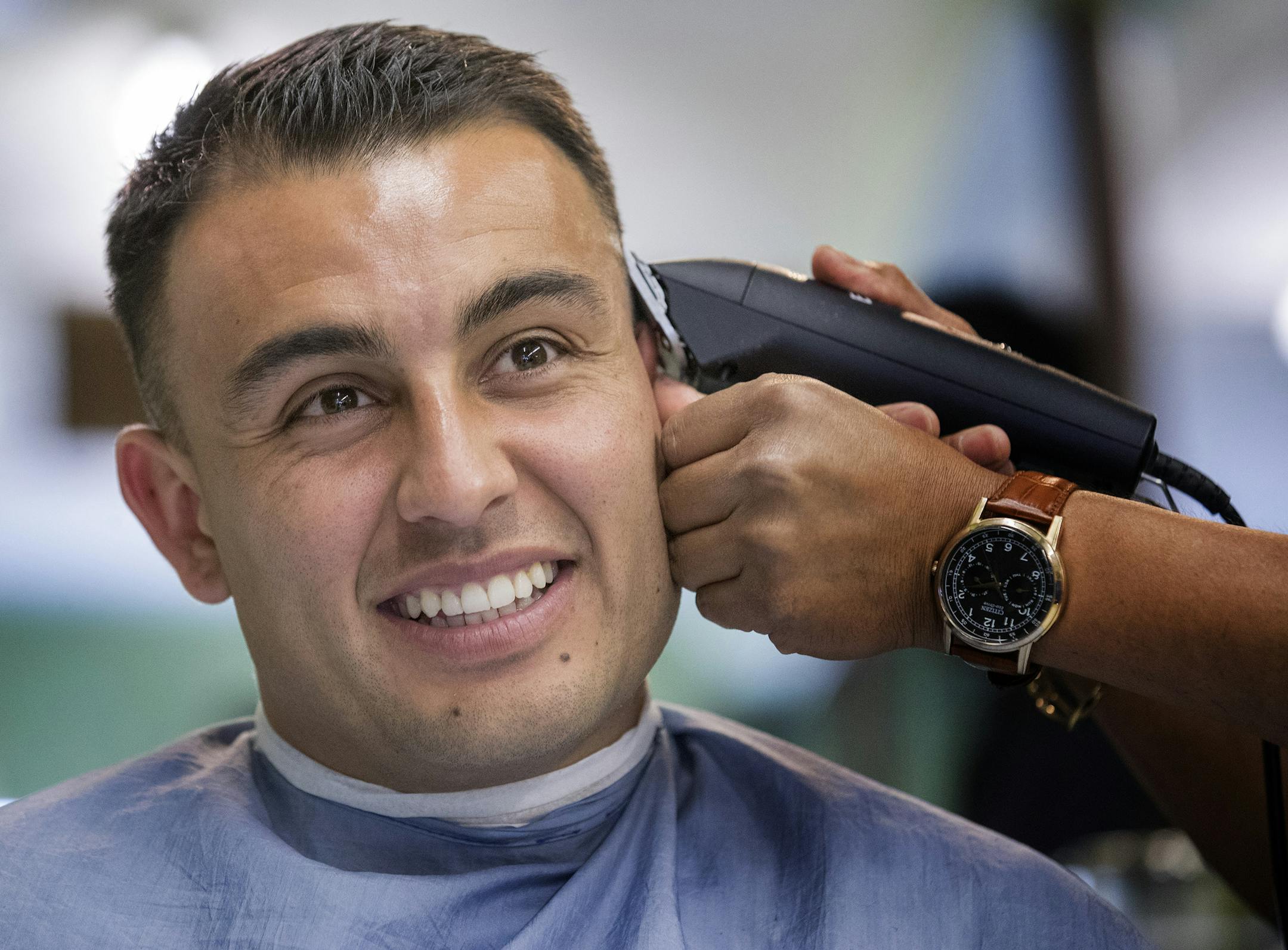Minnesota United FC player Miguel Ibarra got a haircut at J&C Champions in Minneapolis. ] CARLOS GONZALEZ &#xef; cgonzalez@startribune.com - June 1, 2017, Minneapolis, MN, Minnesota United Loons, Haircuts, J&C Champions Salon and Barber, four or five players will be getting hair cuts. Among them: Christian Ramirez, Miguel Ibarra, Bashkim Kadrii, Abu Danladi, Brent Kallman