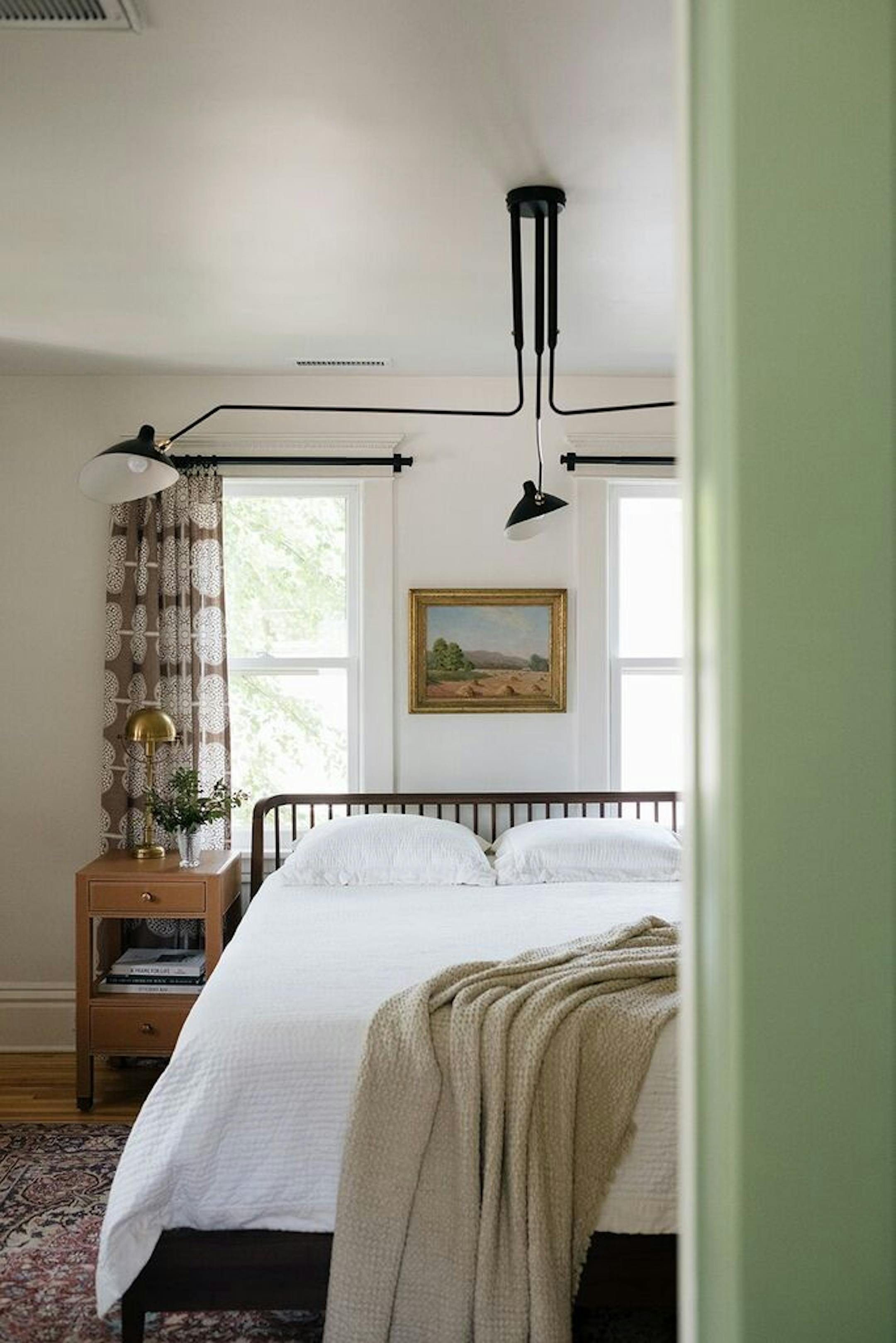 A pocket door separates the bedroom and bathroom.