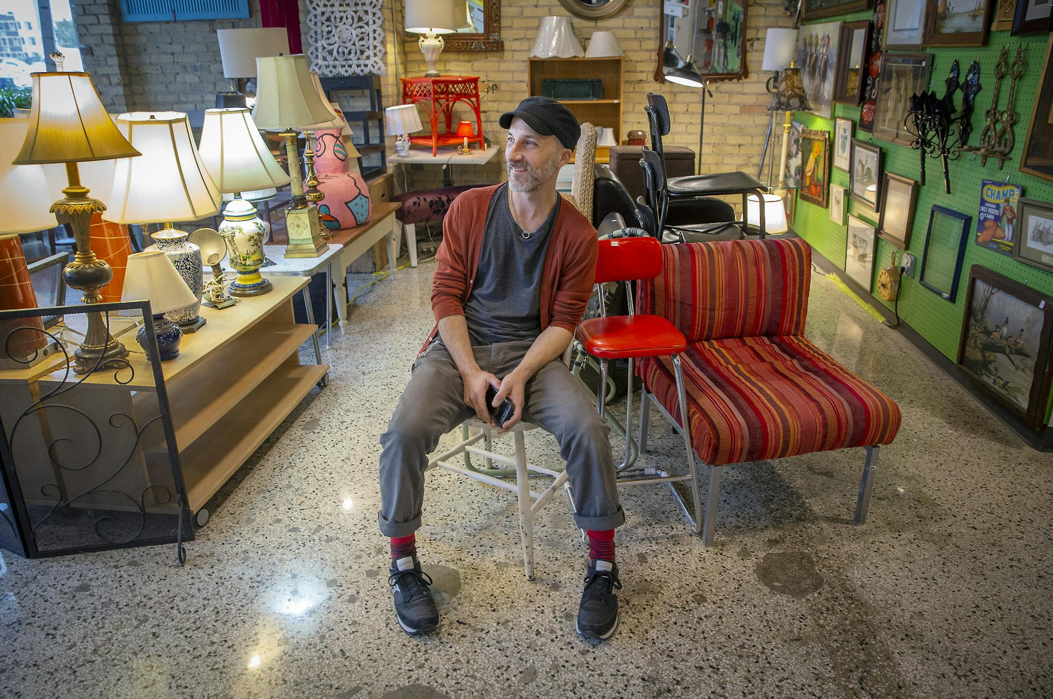 Old School Steeple People's Manager Joe Partyka took a quick breather before going back to work at the store's new location, Friday, October 26, 2018 in Minneapolis, MN. The popular store had to close last year after their building was being razed for redevelopment. ] ELIZABETH FLORES ï liz.flores@startribune.com