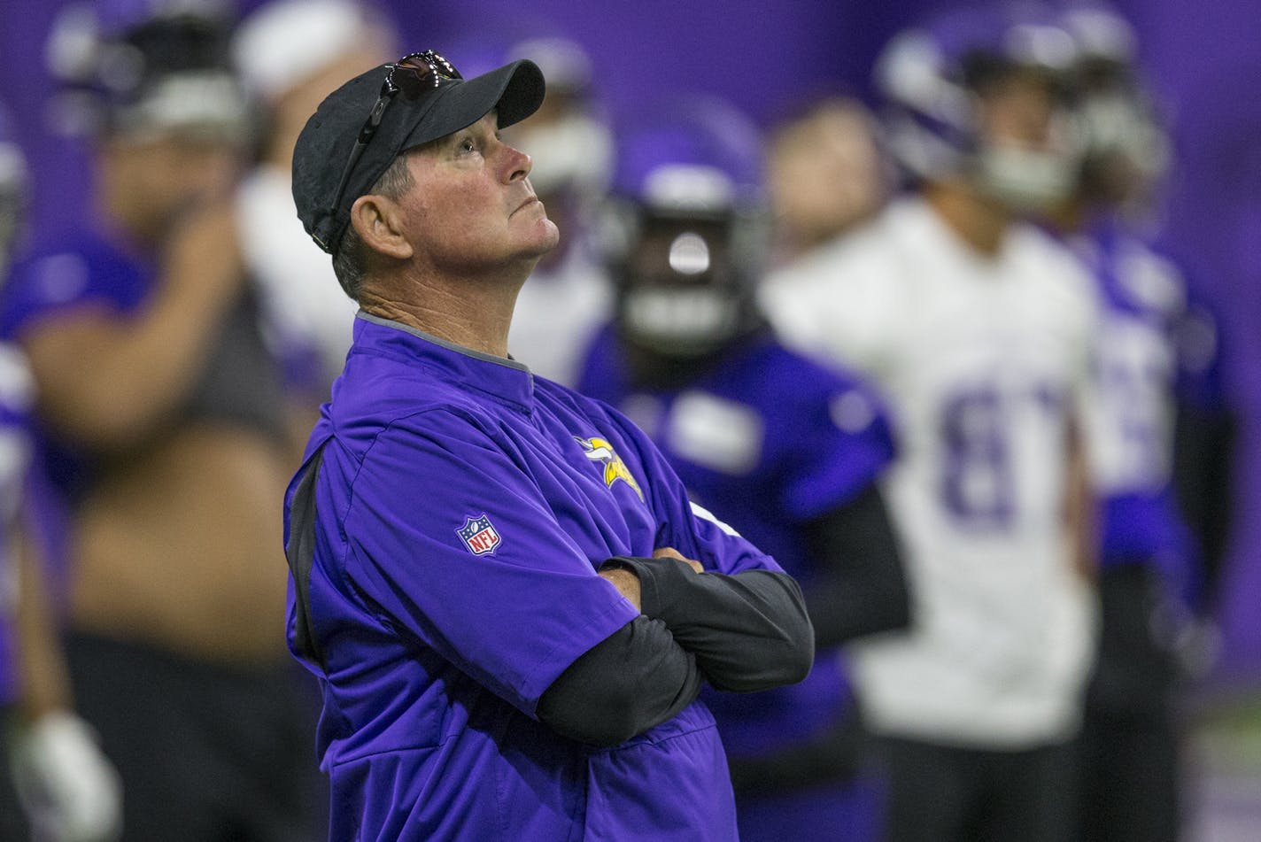 Minnesota Vikings head coach Mike Zimmer watches during drills at the team's NFL football training facility in Eagan, Minn. Tuesday, June 11, 2019. (AP Photo/Andy Clayton- King)