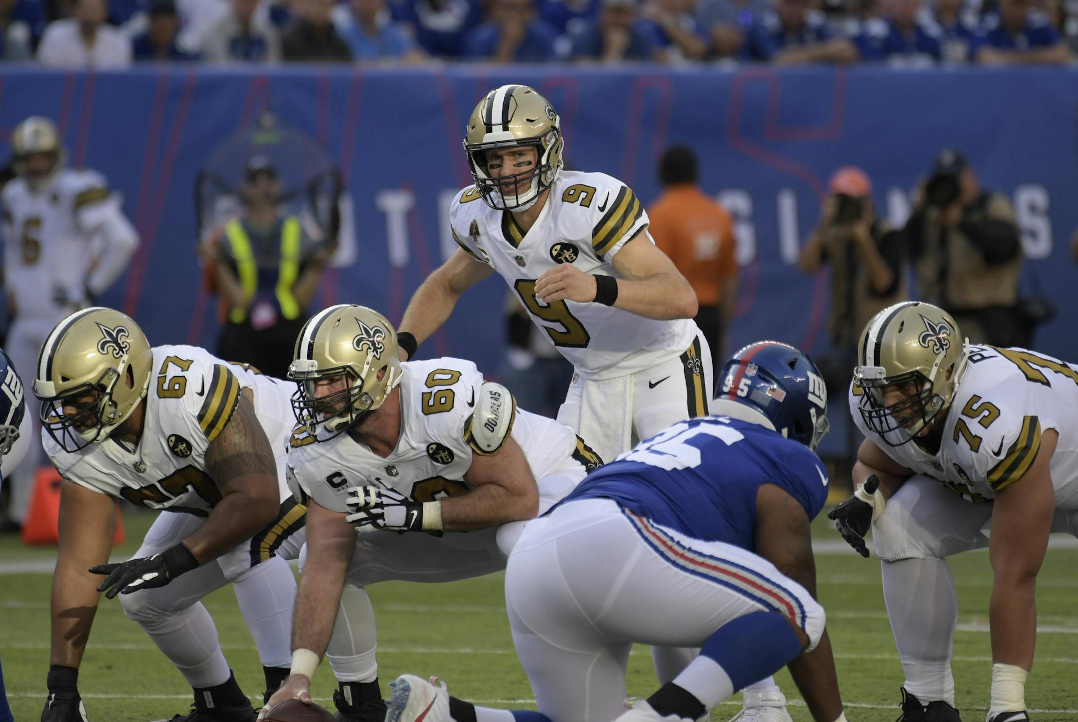 New Orleans Saints quarterback Drew Brees, center, calls a play during the first half of an NFL football game against the New York Giants, Sunday, Sept. 30, 2018, in East Rutherford, N.J. (AP Photo/Bill Kostroun) ORG XMIT: NYOTK