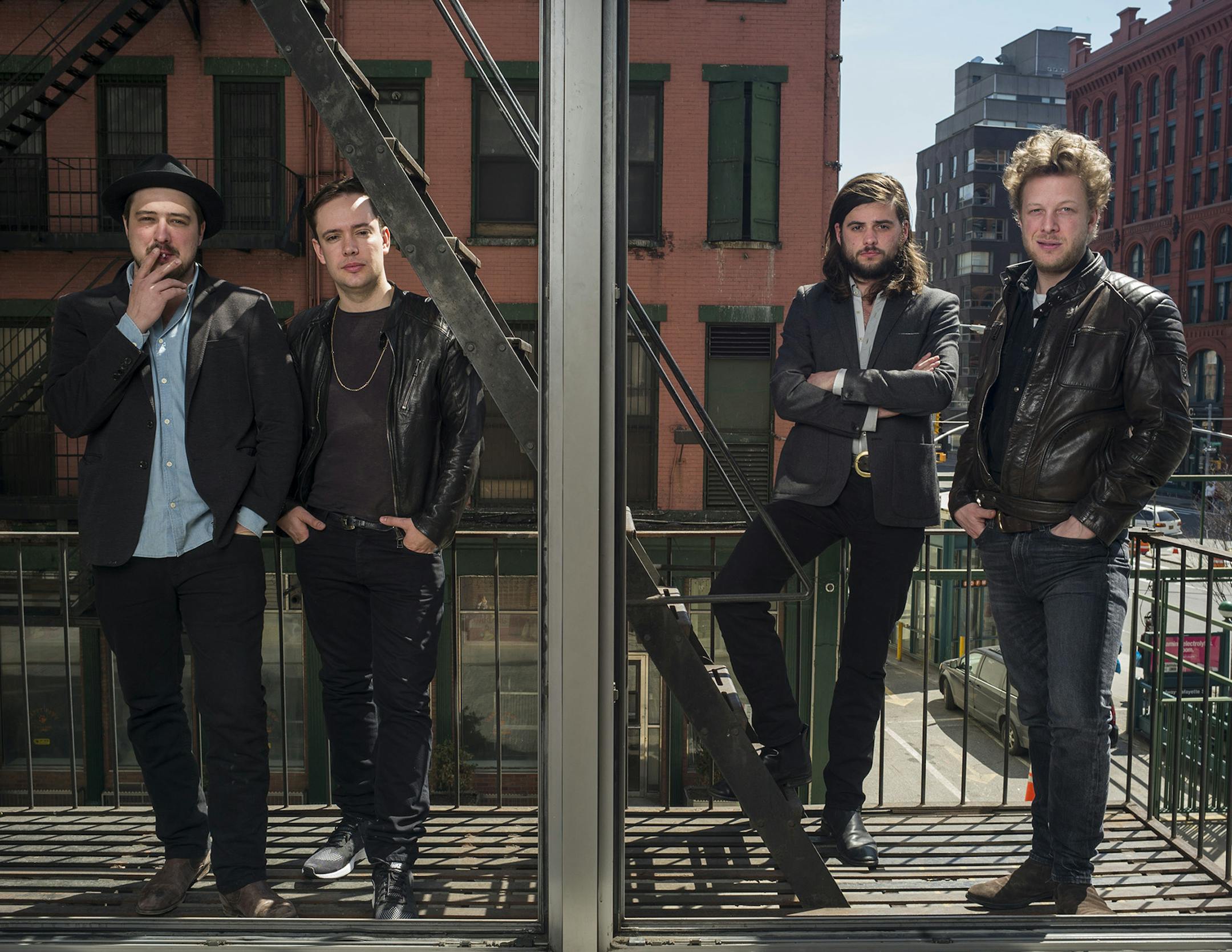 From left, Marcus Mumford, Ben Lovett, Winston Marhsall and Ted Dwane of the band Mumford & Sons pose for a portrait in promotion of their forthcoming album "Wilder Mind" on Monday, April 6, 2015 in New York. (Photo by Drew Gurian/Invision/AP) ORG XMIT: INVW