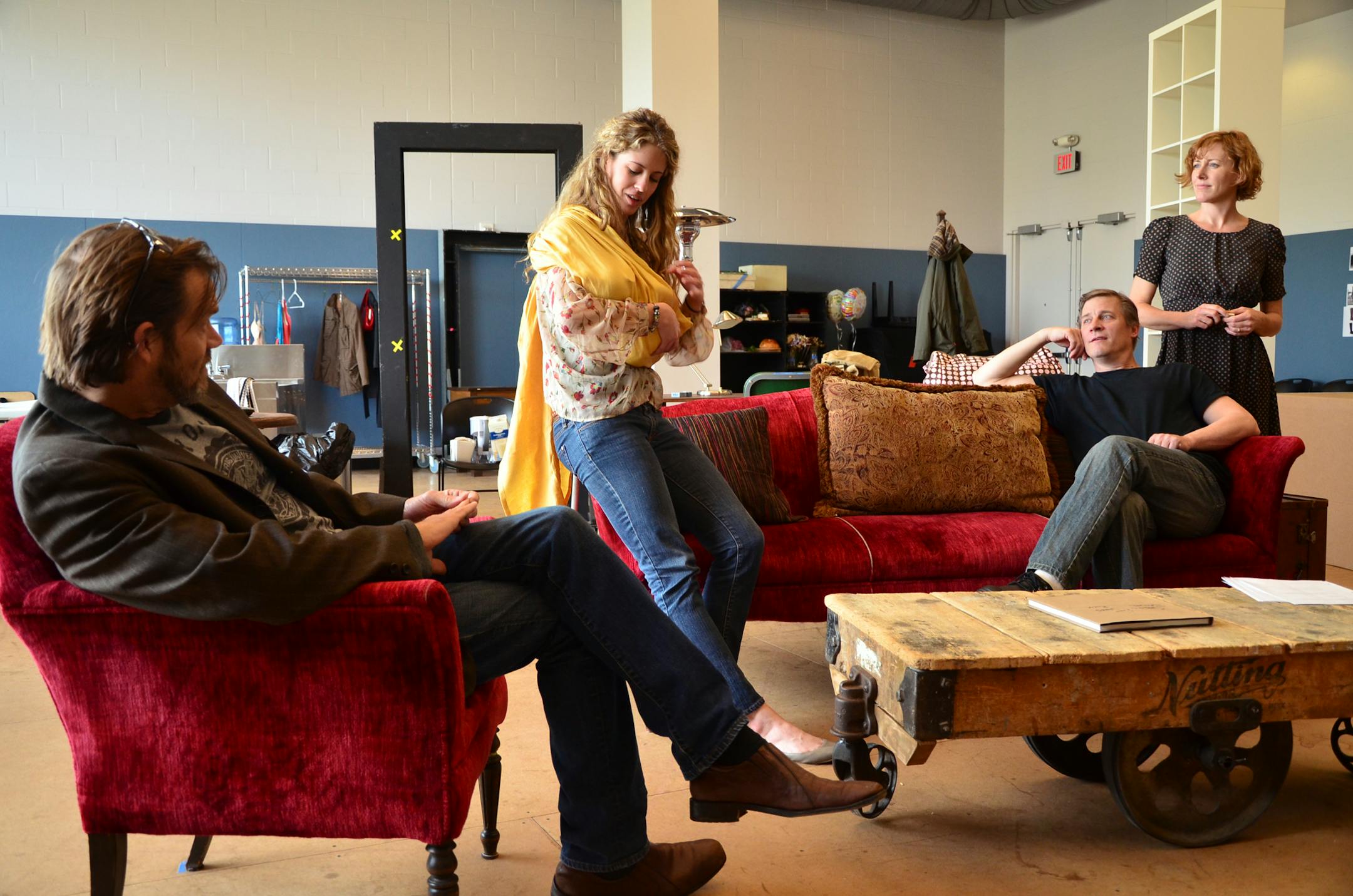 Mark Benninghofen, left, Valeri Mudek, Bill McCallum and Sarah Agnew in "Time Stands Still" at the Guthrie Theater.