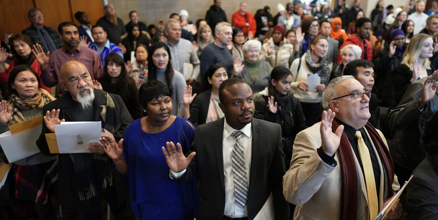 The International Institute of Minnesota, a refugee resettlement agency in St. Paul, is celebrating its centennial this week. On Tuesday, 126 new immigrants and refugees, from 38 different countries were sworn in as US citizens at a ceremony at the Institute. ] A look at its work sheds light into the varying waves of refugees that have arrived in Minnesota and the U.S. ]
brian.peterson@startribune.com
St. Paul, MN
Tuesday, December 11, 2019