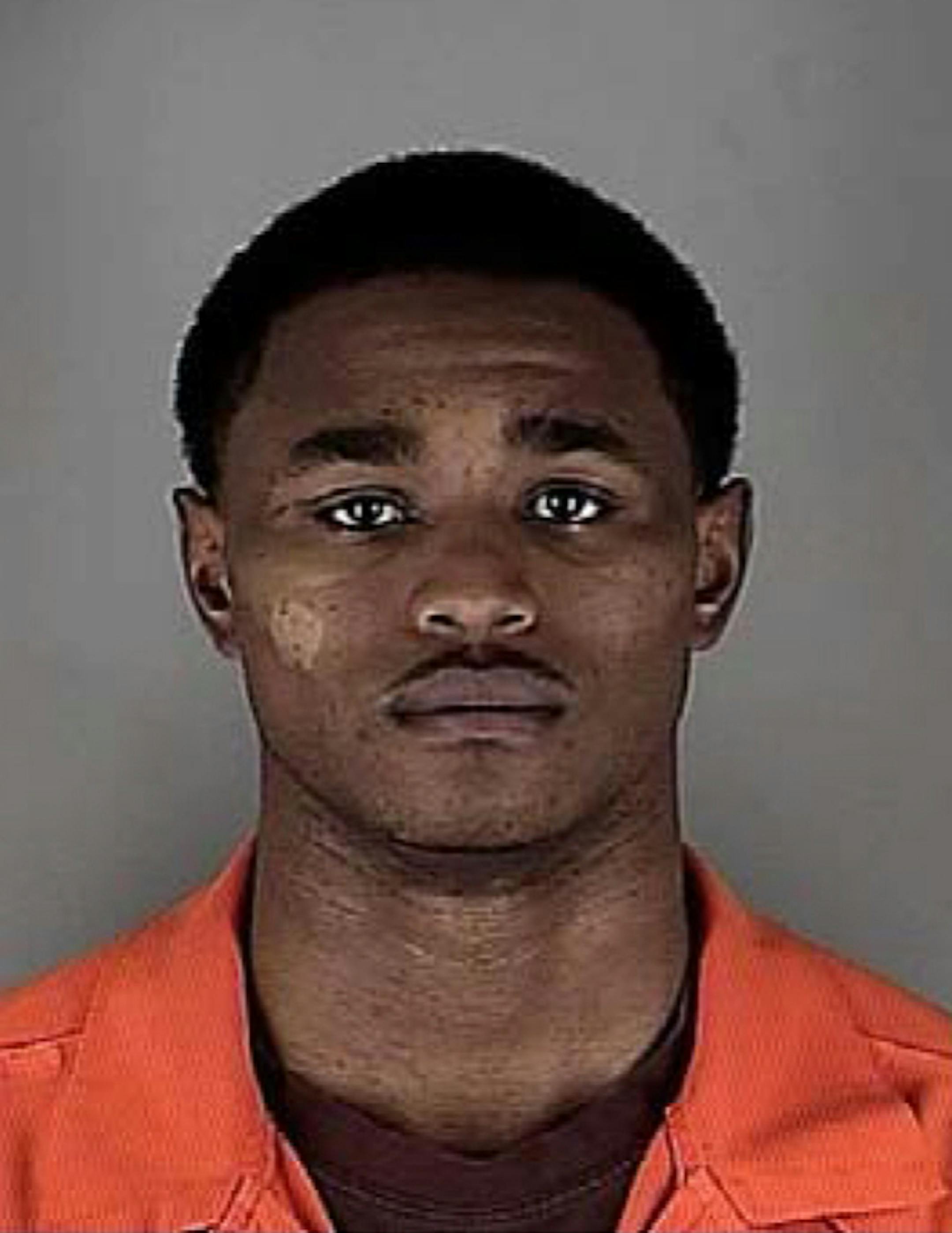 This booking photo released by the Hennepin County Jail in Minneapolis, shows Minnesota college basketball player Daquein McNeil, who was arrested Monday, Nov. 24, 2014, on a charge of domestic assault. He was suspended from all team activities, athletic director Norwood Teague said. (AP Photo/Hennepin County Jail, via The Star Tribune)