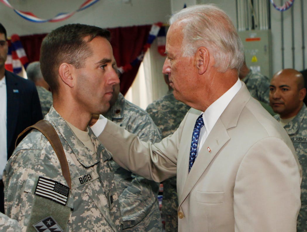 Beau and Joe Biden, shown at Camp Victory on the outskirts of Baghdad, Iraq, in 2009.