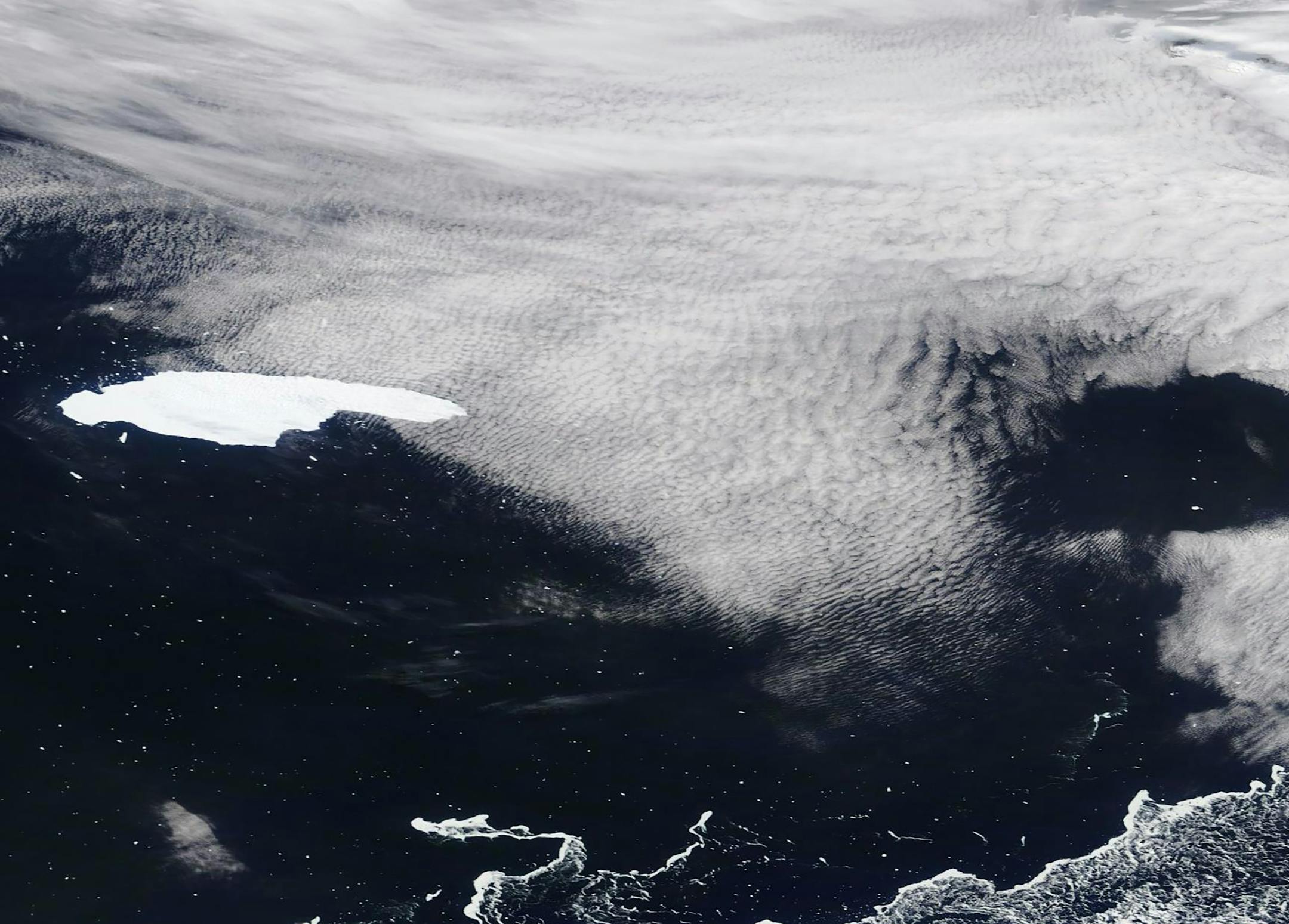 In a photo provided by NASA, the iceberg A68a in the South Atlantic was more than 200 miles away from the coast of the British island territory of South Georgia. An iceberg roughly the size of Delaware that is headed toward the sub-Antarctic island of South Georgia has experts worried about the possibility of it blocking wildlife from food sources and threatening the island's ecosystem. (NASA via The New York Times) -- EDITORIAL USE ONLY --