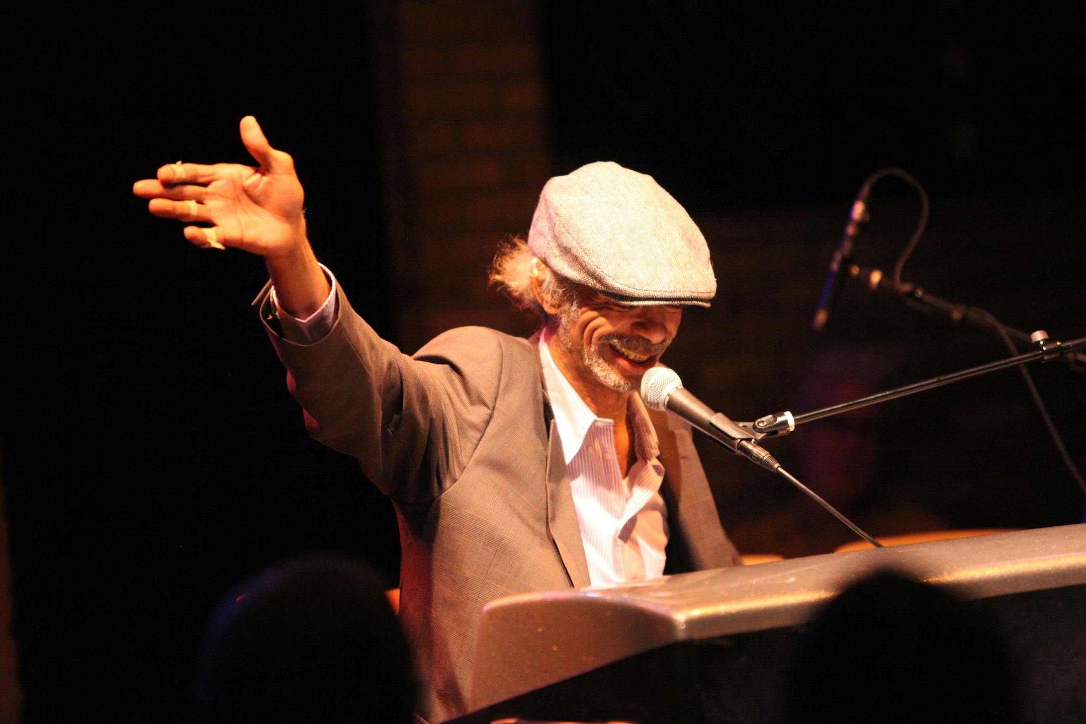 Gil Scott-Heron sang a song and while playing a keyboard at the Dakota Jazz Club Wednesday night.