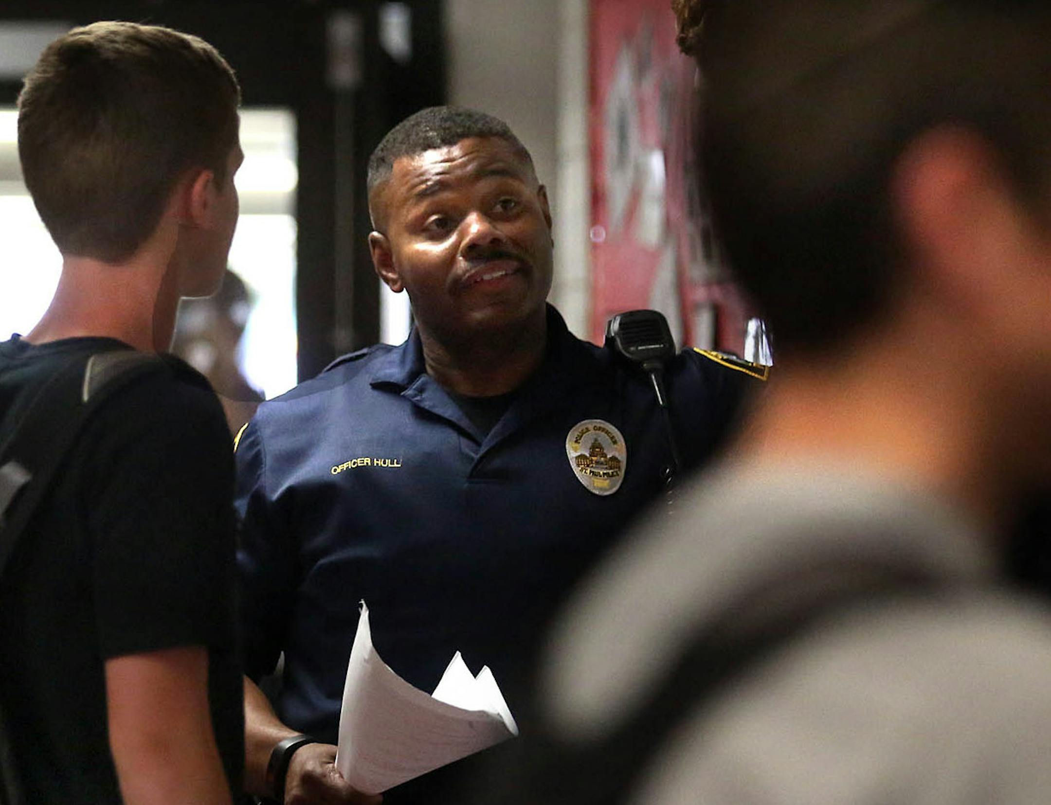 Cortez Hull, school resource officer (SRO) at Highland Park High School in St. Paul, interacted with students at the end of the school the day. ] JIM GEHRZ &#xef; james.gehrz@startribune.com / St. Paul, MN / June 8, 2016 3:00 PM &#xf1; BACKGROUND INFORMATION: Recent events have brought sharp contrasts in how school resource officers -- cops in the schools -- are viewed locally, and their future in two of the state's largest districts is a matter now up for debate. In St. Paul, district leaders h