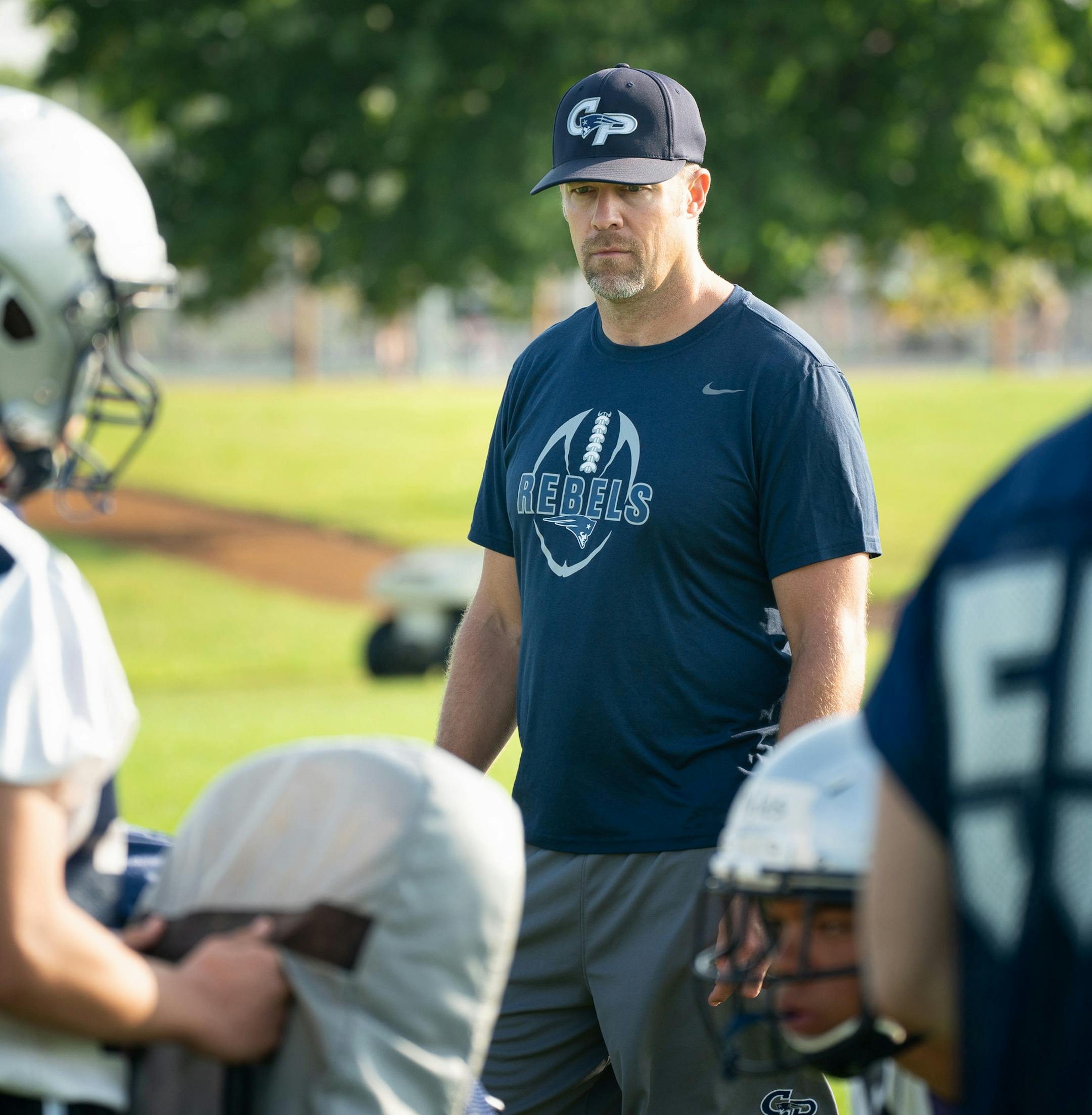 Champlin Park's new head coach Nick Keenan at the team's first practice. ] GLEN STUBBE ï glen.stubbe@startribune.com Monday, August 13, 2018 Champlin Park's first official practice under new head coach Nick Keenan.