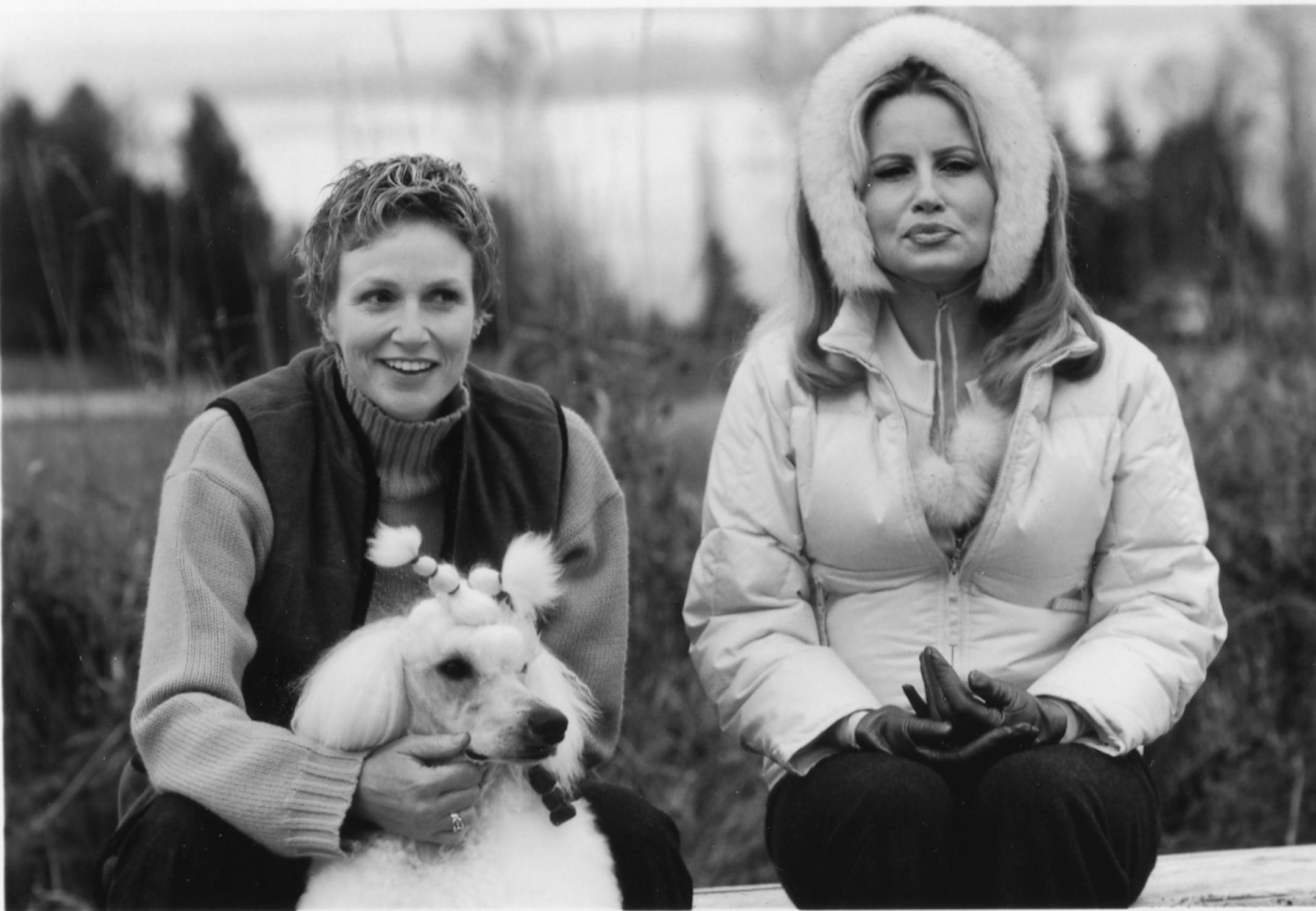 Jane Lynch plays ace dog handler Christy Cummings in Christopher Guest's "Best in Show," showing a dog for owner Sherri Ann Ward Cabot, played by Jennifer Coolidge.