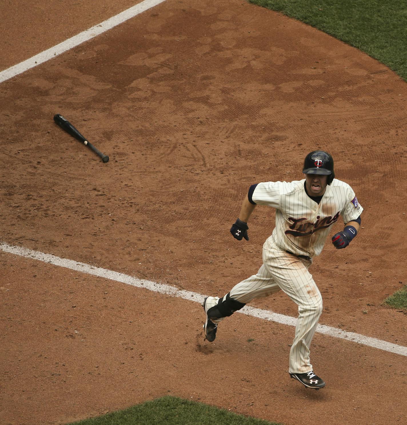 Minnesota Twins second baseman Brian Dozier shouted to the Twins' dugout as he headed for first after hitting a two run homer in the sixth inning Wednesday afternoon at Target Field. JEFF WHEELER &#xef; jeff.wheeler@startribune.com The Twins swept the Baltimore Orioles with a 5-3 win Wednesday afternoon, July 8, 2015 at Target Field in Minneapolis. ORG XMIT: MIN1507081559460653