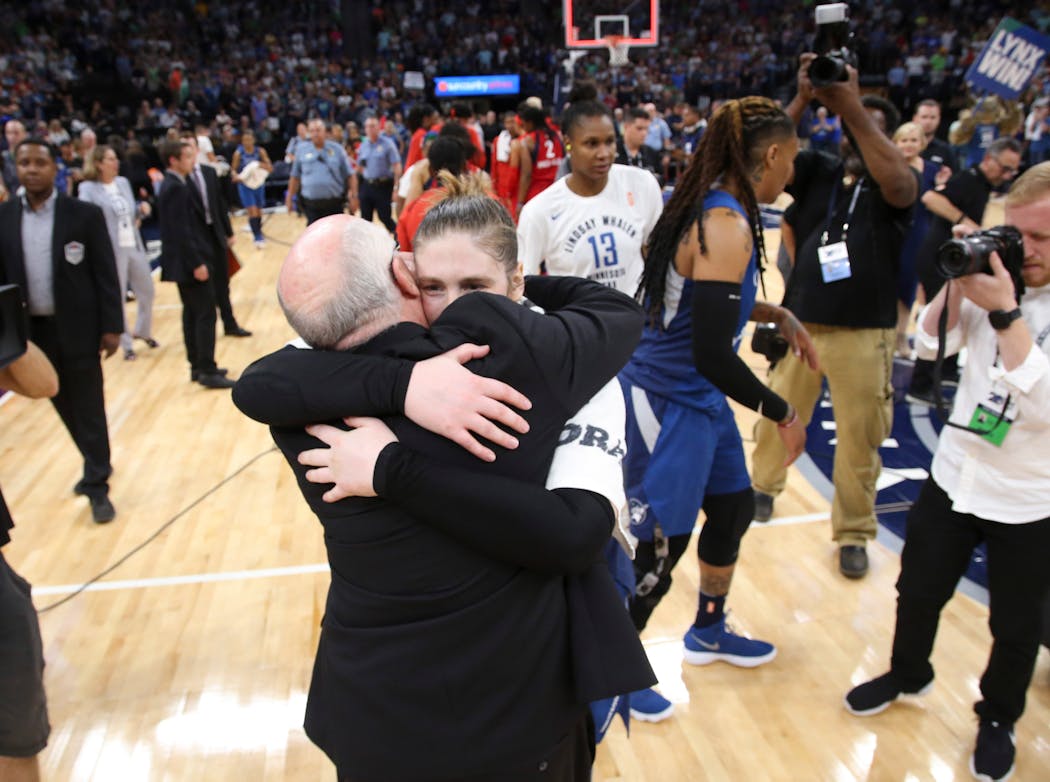 Thibault-DuDonis' father, Washington Mystics coach Mike Thibault, hugged Lindsay Whalen after her final regular-season game with the Lynx in 2018.