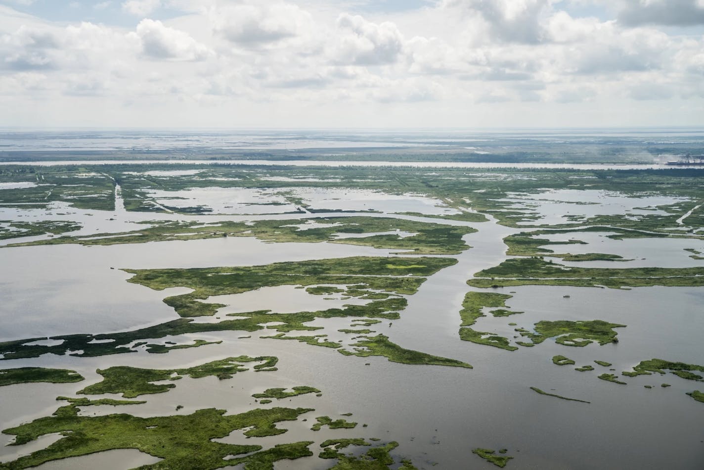 An aerial view of broken wetlands in Plaquemines Parish. Projections by Climate Central indicate that the parish could lose another 100,000 acres of wetlands by the end of the century. Credit: Kezia Setyawan, WWNO