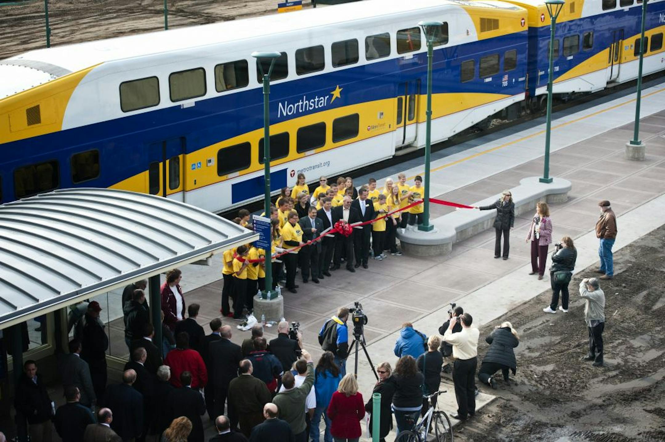 Big ceremonial scissors were distributed for the ribbon-cutting ceremony for the Ramsey station of the Northstar Commuter rail line, Thursday, November 8, 2012.