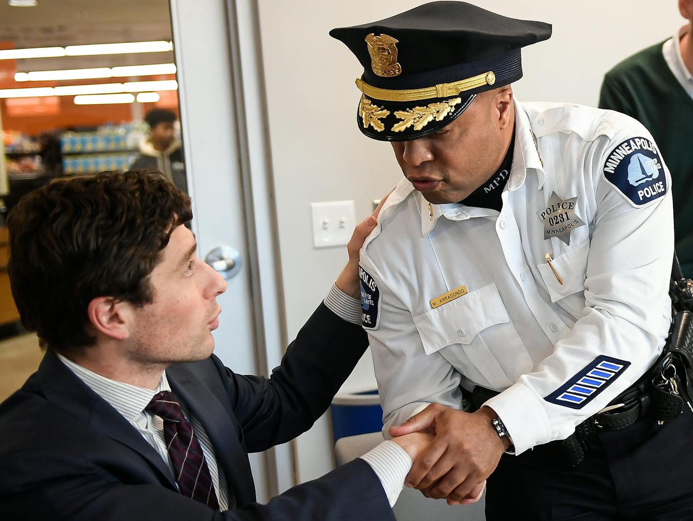 Minneapolis Mayor Jacob Frey shook hands with Minneapolis Police Chief Medaria Arradondo