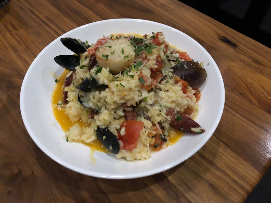 Saffron paella at PLate on Main is chock-full of seafood.