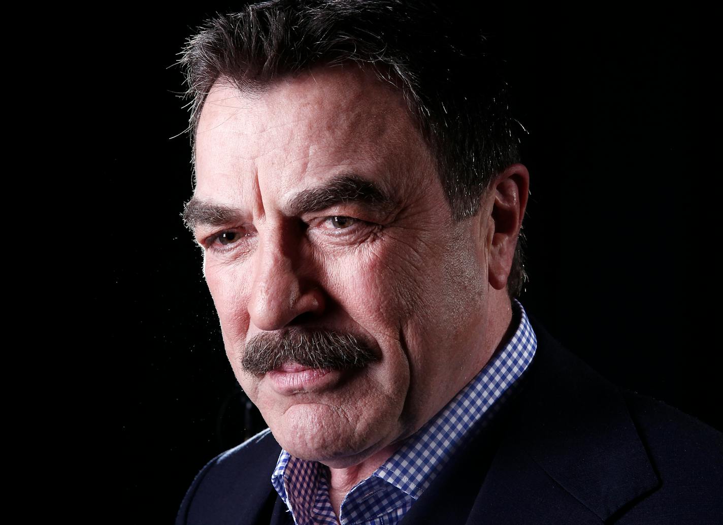 This March 21, 2012 file photo Actor Tom Selleck poses for a portrait in New York. A lawsuit accuses Selleck of stealing truckloads of water from a public hydrant and bringing it to his Southern California ranch.