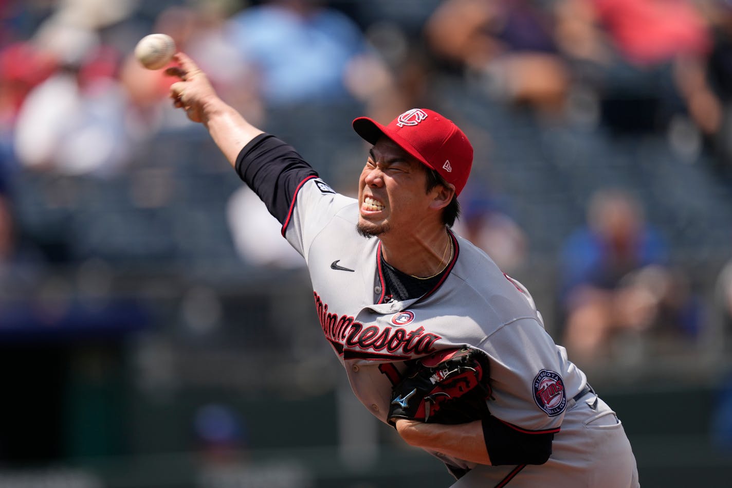 Minnesota Twins starting pitcher Kenta Maeda throws during the sixth inning of a baseball game against the Kansas City Royals Sunday, July 4, 2021, in Kansas City, Mo. (AP Photo/Charlie Riedel)