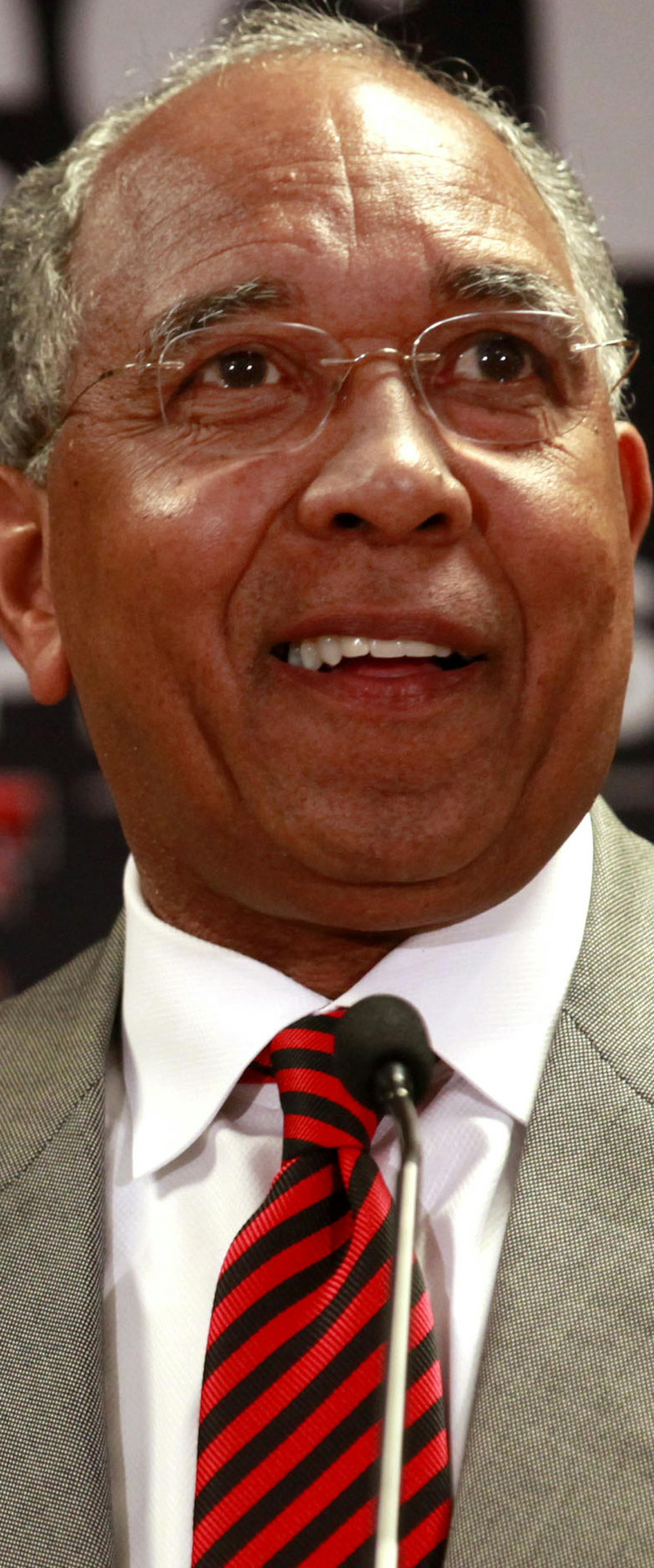Tubby Smith smiles after being introduced as the new men's basketball coach at Texas Tech during an NCAA college news conference in Lubbock, Texas, Tuesday, April. 2, 2013. (AP Photo/Lubbock Avalanche-Journal, Stephen Spillman)