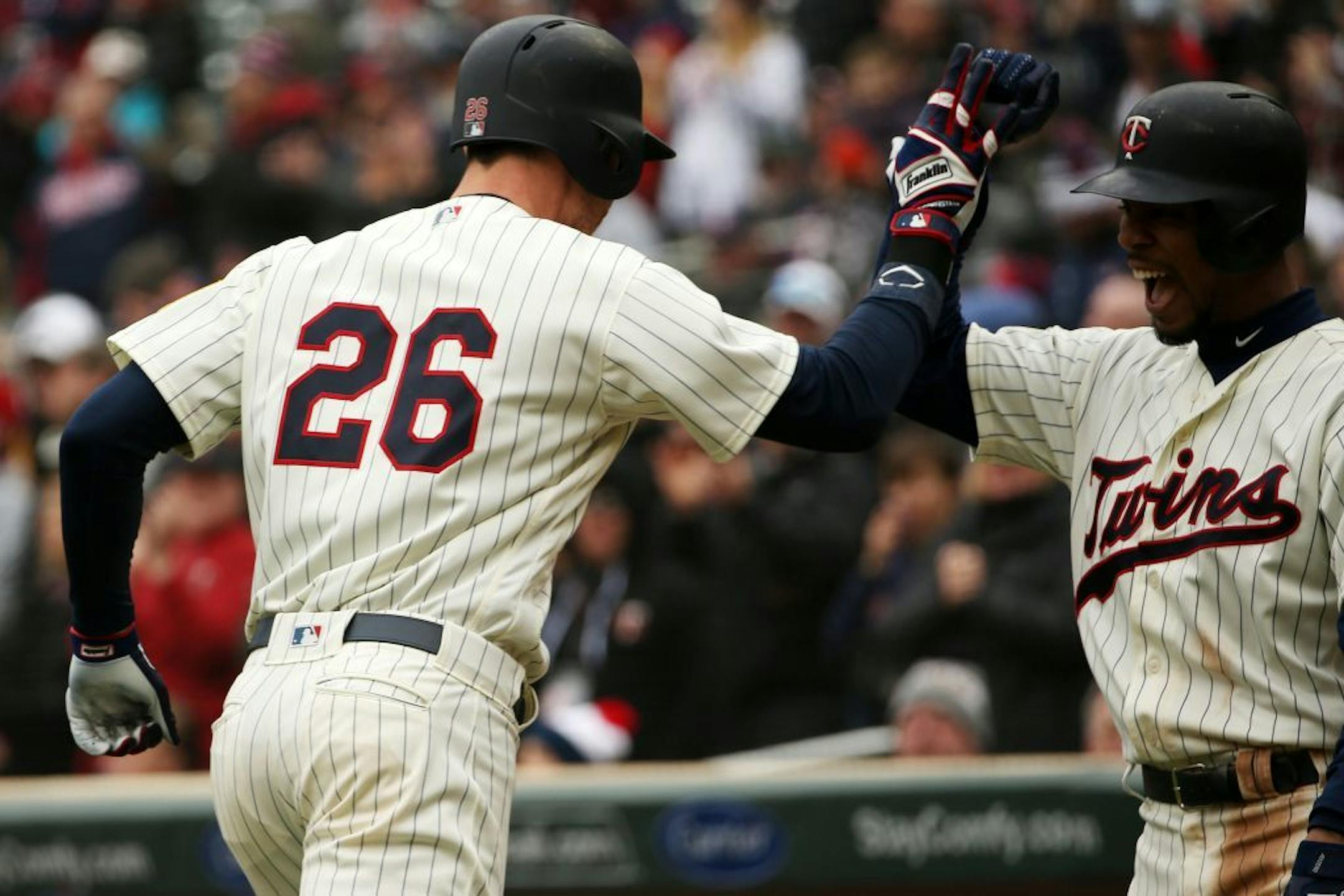 Minnesota Twins right fielder Max Kepler (26) celebrated with Minnesota Twins center fielder Byron Buxton (25) after he hit a two-run home run last season.