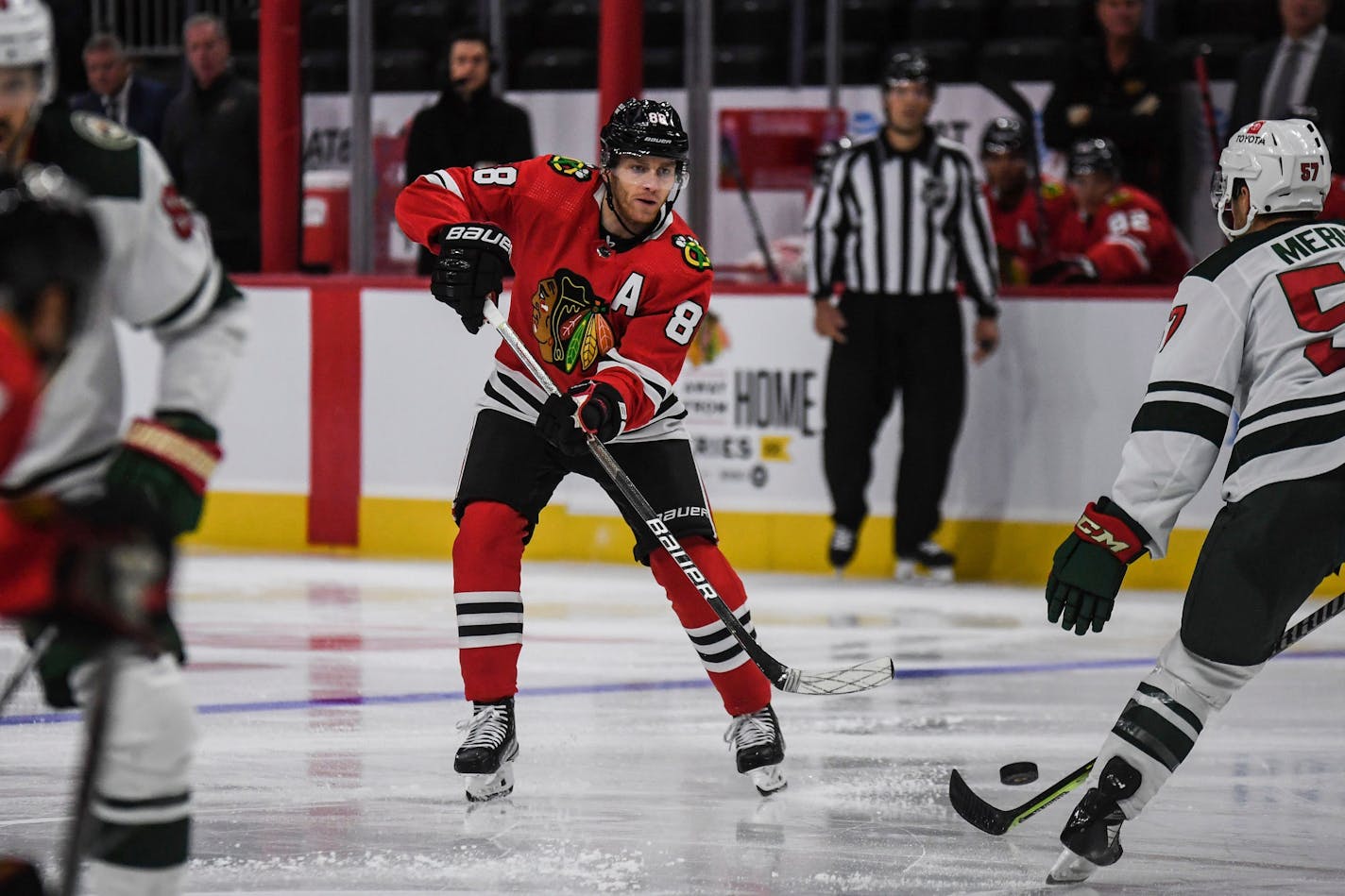 Chicago Blackhawks' Patrick Kane makes a pass during the second period of a preseason NHL hockey game against Minnesota Wild Sunday, Oct. 2, 2022, in Milwaukee. (AP Photo/Kenny Yoo)