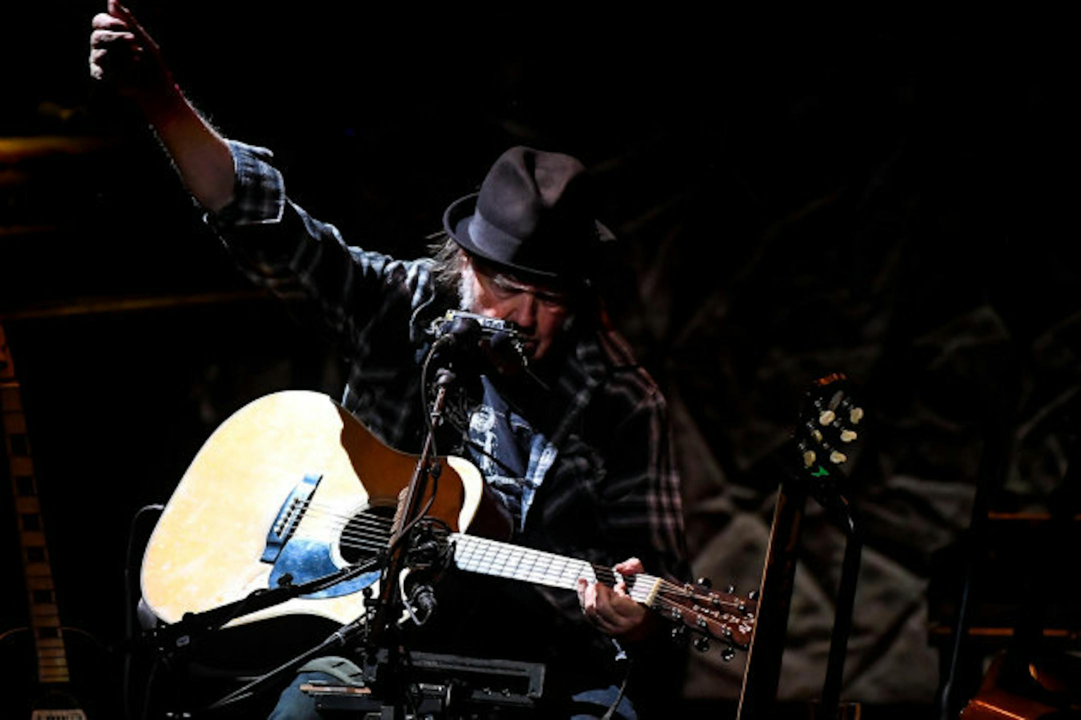 Neil Young rolled up his flannel sleeves again Tuesday at the State Theatre. / Aaron Lavinsky, Star Tribune