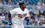Minnesota Twins' Miguel Sano watches his two-run home run against the Chicago White Sox during the first inning of a baseball game Tuesday, June 20, 2