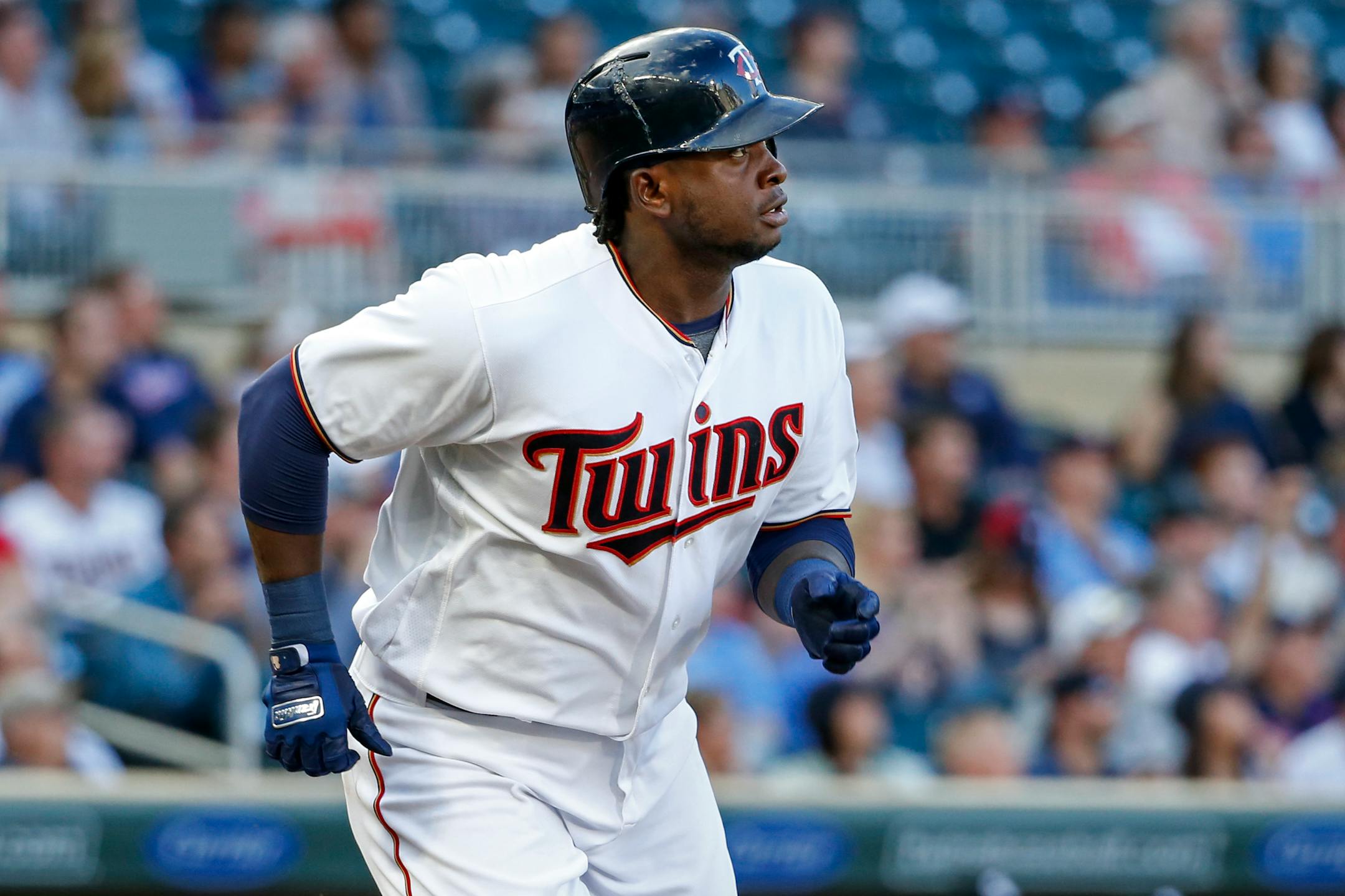 Minnesota Twins' Miguel Sano watches his two-run home run against the Chicago White Sox during the first inning of a baseball game Tuesday, June 20, 2017, in Minneapolis. (AP Photo/Bruce Kluckhohn)