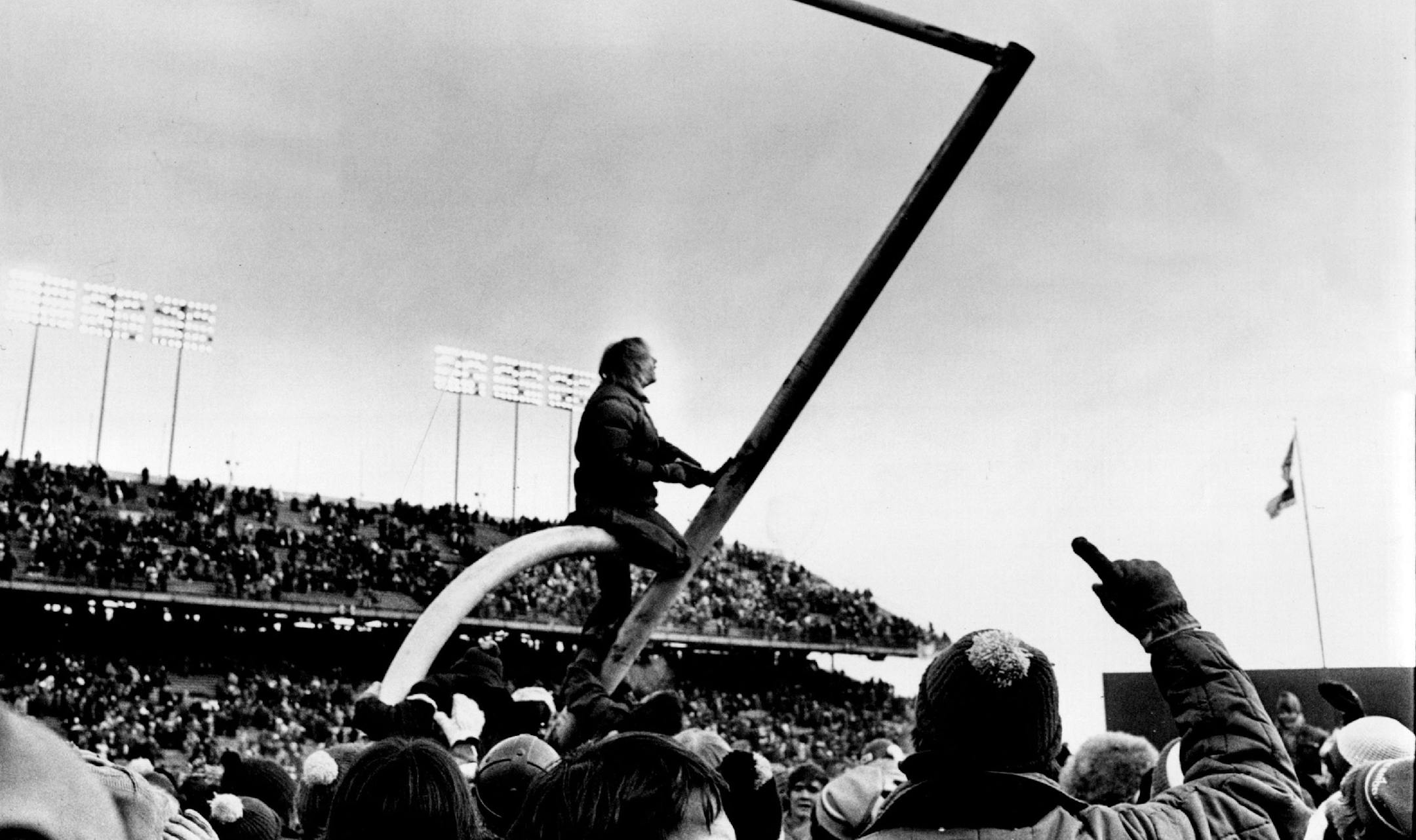 December 27, 1976 A jubilant fan rode a goal post to the ground after the Vikings beat the Rams 24-13 Sunday in Metropolitan Stadium. December 23, 1976 Earl Seubert, Minneapolis Star Tribune ORG XMIT: MIN2016010820095564