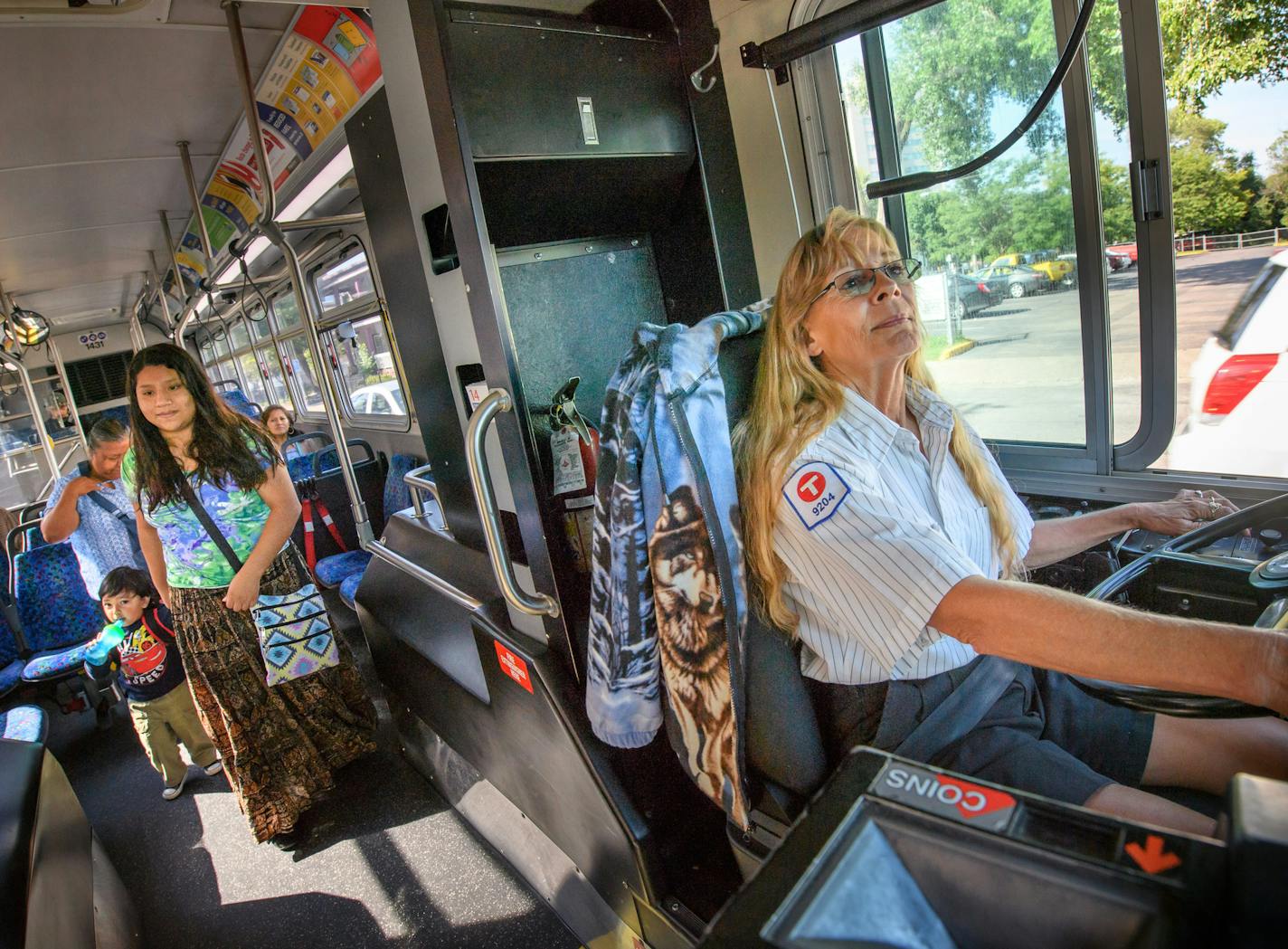 Diane Rude drove her Metro Transit bus along route 14E Friday morning, often greeting passenters with a smile and a wave. The Woodbury resident was assaulted by a deranged passenger. ] GLEN STUBBE * gstubbe@startribune.com Friday, September 2, 2016 Diane Rude, a Woodbury resident who was assaulted by a deranged passenger, is driving the 14E Line through Minneapolis on Friday morning.