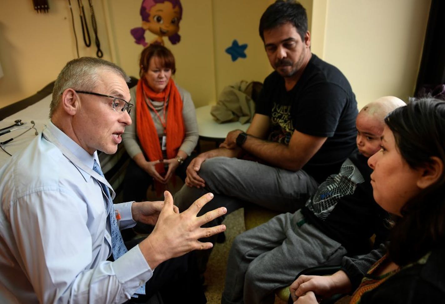 Dr. Jakub Tolar spoke to Pedro and Clara Fulgencio, the parents of Theo Fulgencio, an 8-year old patient from Rio de Janeiro suffering from epidermolysis bullosa. Tolar had just performed an examination of Theo and was giving them an idea of what to expect at this stage of recovery and moving forward.