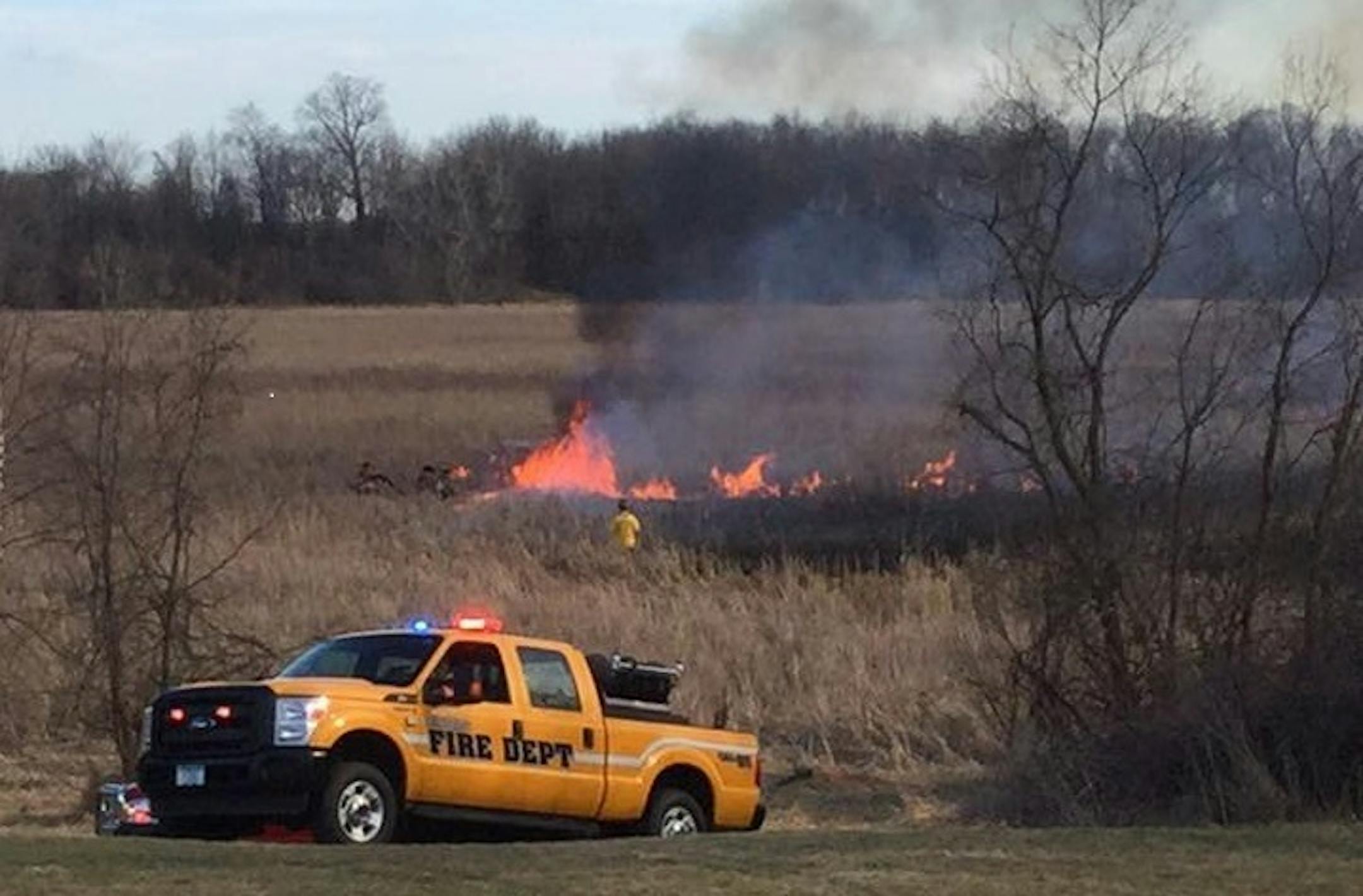 Fire burned on swampy land north of Watertown.