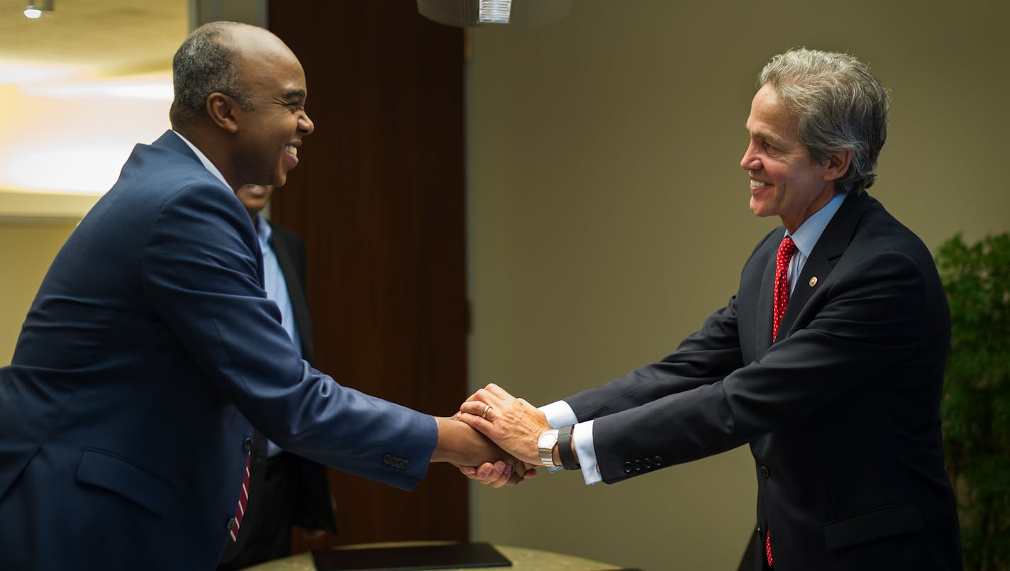 Norm Coleman greeted Mohamed Abdirizak in his Washington, D.C., office. As a lobbyist and political power-broker, he straddles both Arab and Israeli issues.