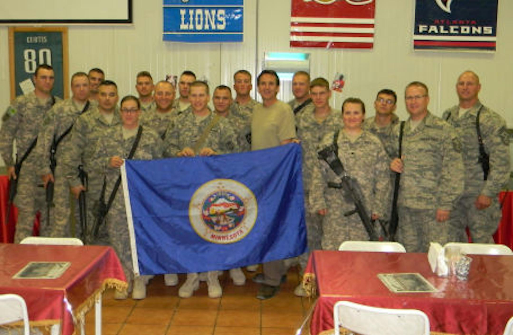 Pawlenty with Minnesota soldiers at Camp Victory in Iraq/ SOURCE: Governor's office