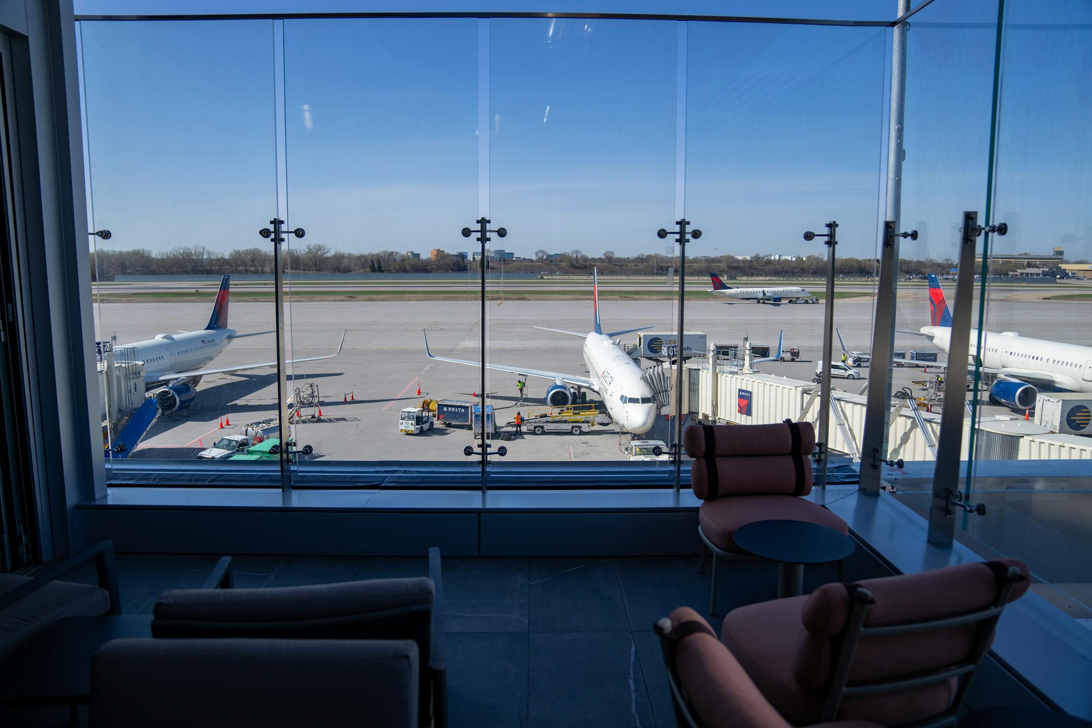 The new Delta Sky Club features an open air patio with views of the tarmac.