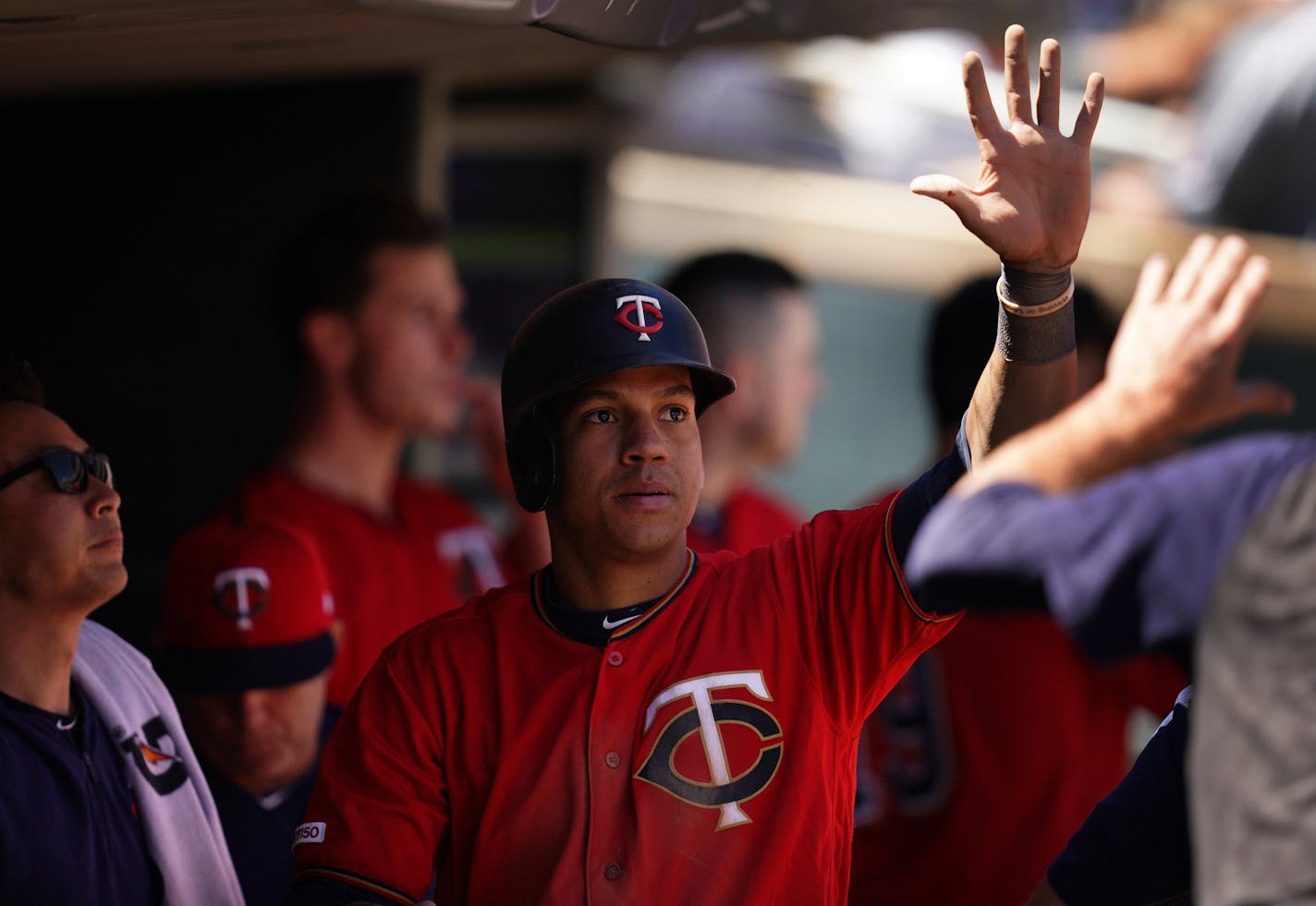 Minnesota Twins shortstop Ehire Adrianza (13) was congratulated after he scored in the sixth inning. ] ANTHONY SOUFFLE &#x2022; anthony.souffle@startribune.com The Minnesota Twins played the Seattle Mariners in an MLB game Thursday, June 13, 2019 at Target Field in Minneapolis.