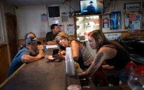 Waitress Amanda Nordlund at BG’s Bar & Grill in Mountain Iron, Minn., in September 2024. Many Minnesota service industry workers are in favor of no