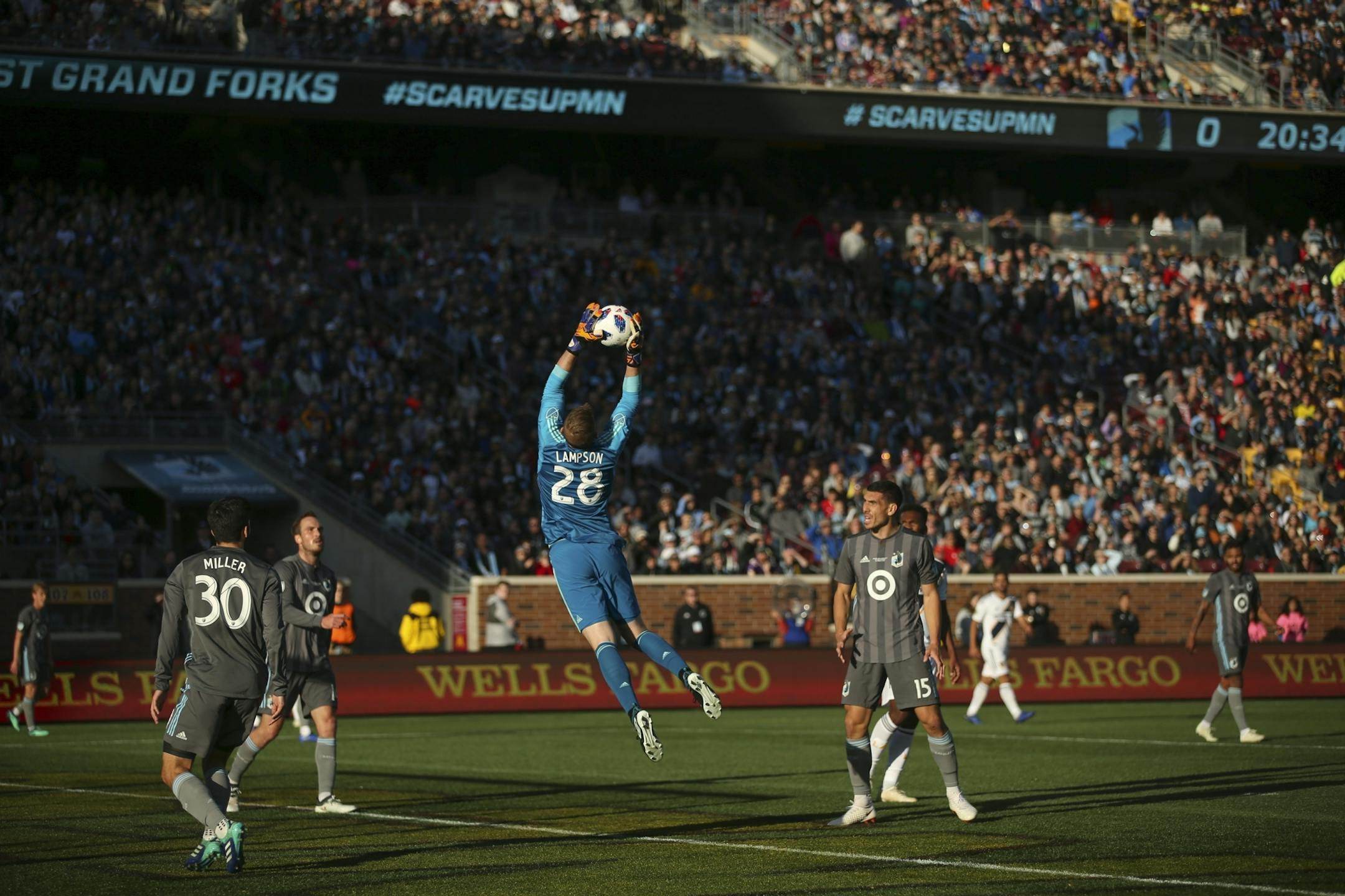 Minnesota United goalkeeper Matt Lampson (28) leapt for a first half save.