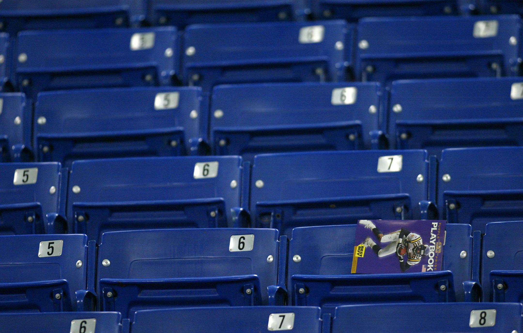GENERAL INFORMATION: MINNEAPOLIS - 12/23/01 - The Vikings lost their final home game of the season to the Jacksonville Jaguars Sunday afternoon at the Metrodome by a score of 33 - 3. IN THIS PHOTO: A photo of Cris Carter, who may have played his final home game as a Viking, was left behind on a Metrodome seat at the end of the game. ORG XMIT: MIN2013020217220833